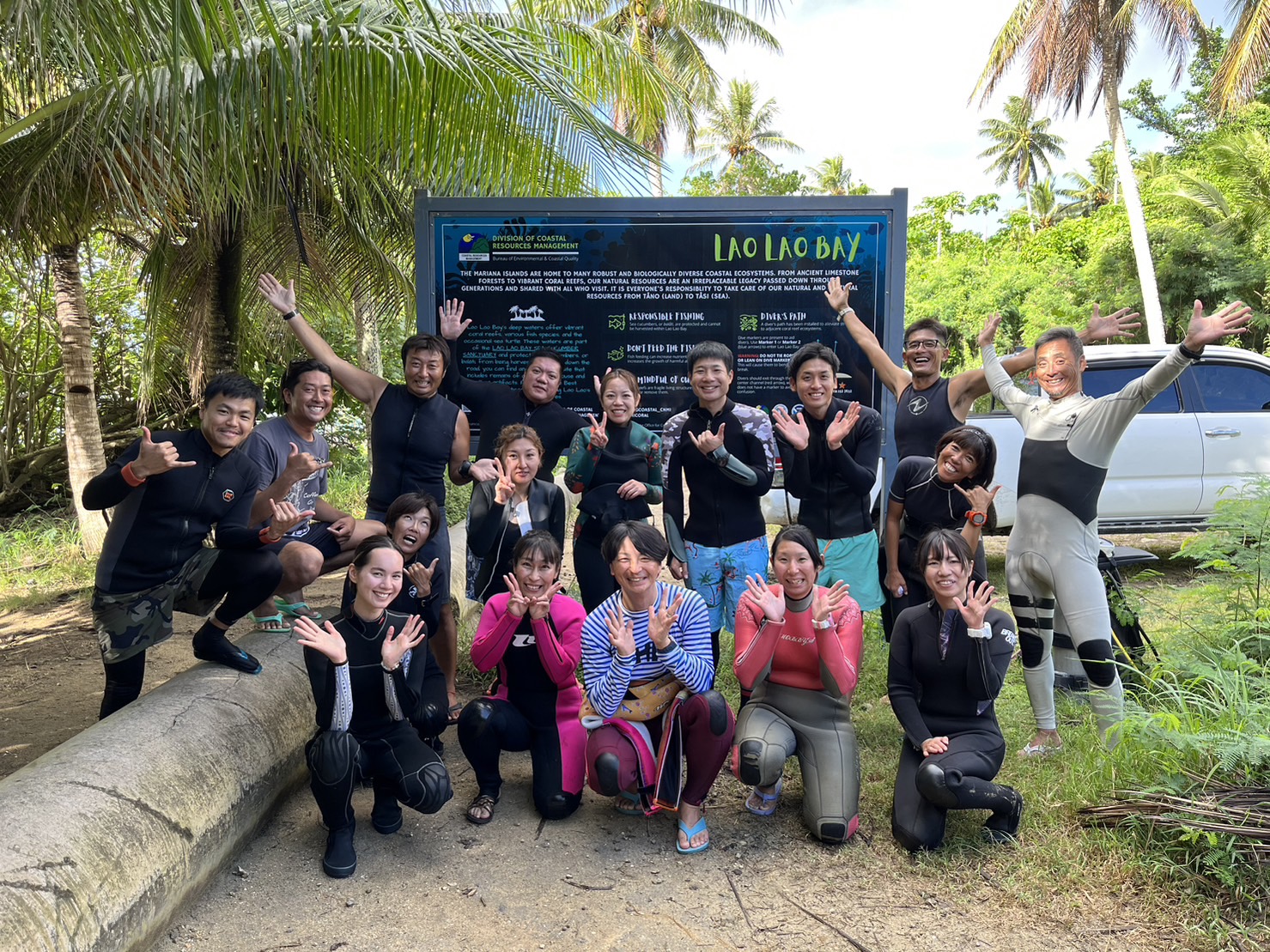 Participants in the Marianas Diving Promotion underwater photography seminar take a commemorative photo at Laulau Beach in Saipan on Nov. 25, 2023. 