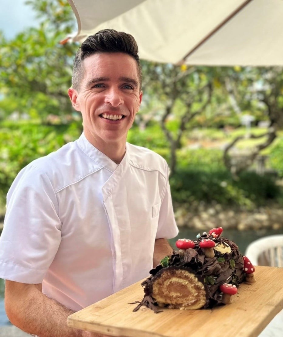 Chef Jody O'Sullivan with his Christmas cake, “Buche de Noel.”