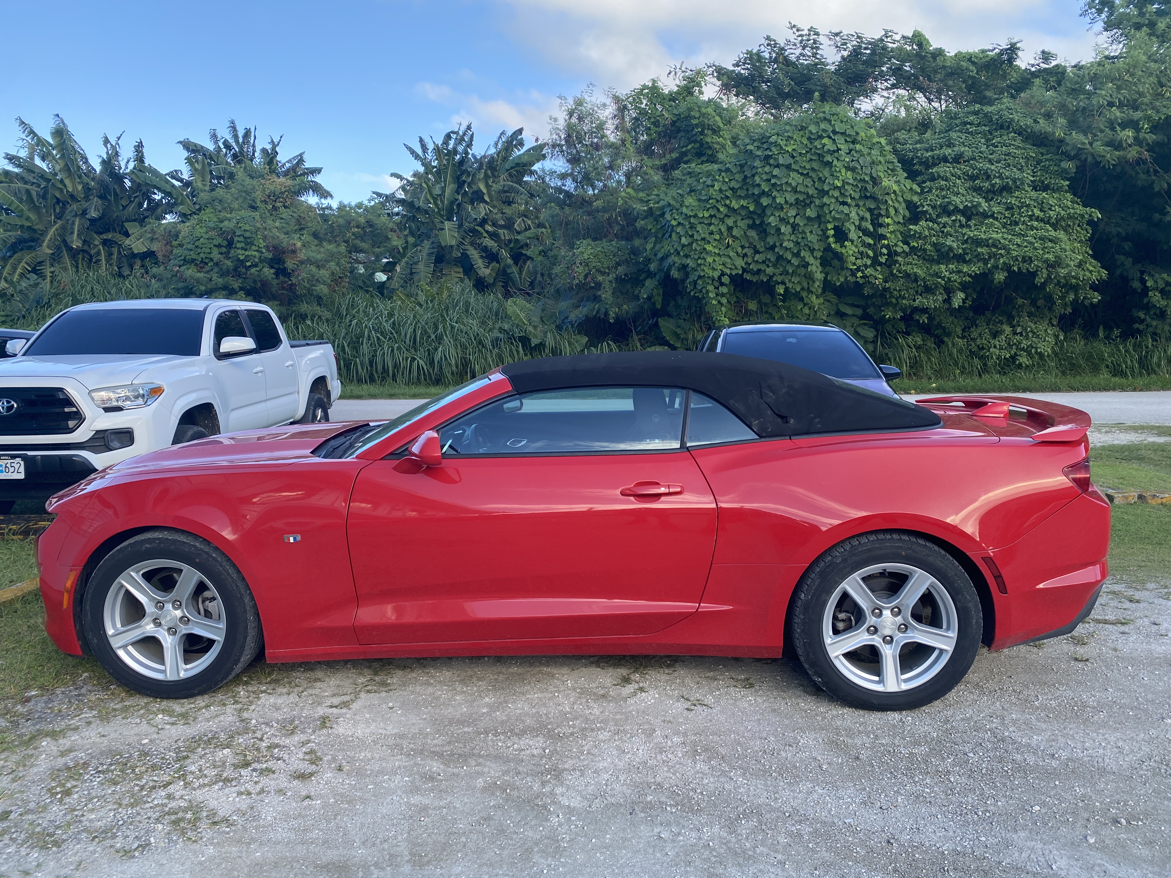 A photo of the red convertible that belongs to QQ Car Rental