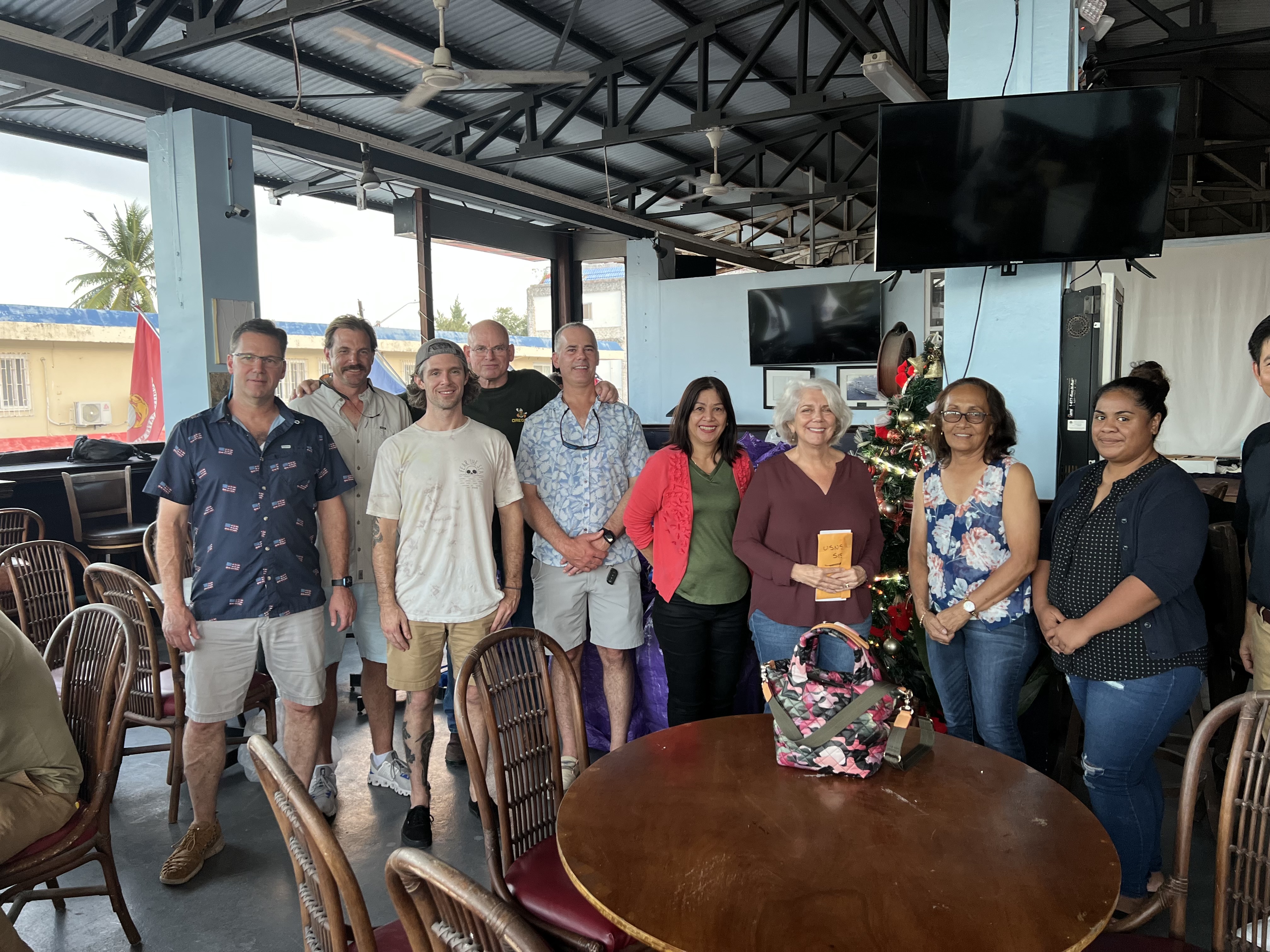Captain Tucker, Chief Mate Larrabee, Captain Bradford, First, Engineer Lampke, Captain Huggins, Karidat Executive Director Lauri Ogumorro,  shelter supervisor Lisa Ada, accounts coordinator Maggie Muna and shelter staff member Patsy Dowai.