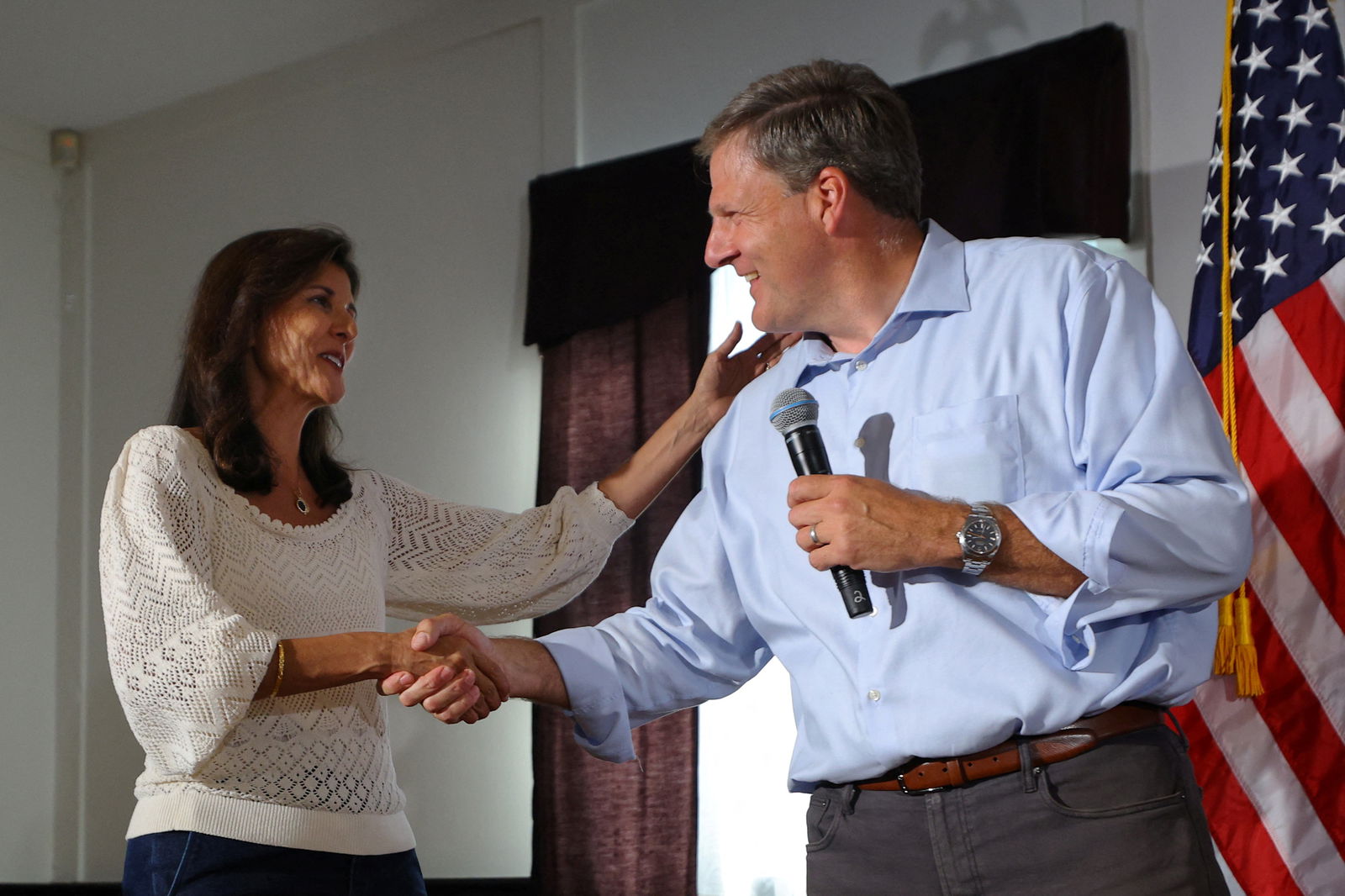 Republican presidential candidate and former U.S. Ambassador to the United Nations Nikki Haley is introduced by New Hampshire Governor Chris Sununu at a campaign town hall meeting in Merrimack, New Hampshire, U.S., September 6, 2023. REUTERS/Brian Snyder/File Photo