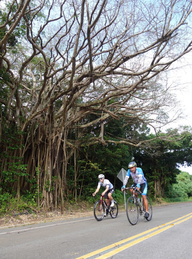 Cyclists enjoy a brief respite during Hell of the Marianas on Saipan.