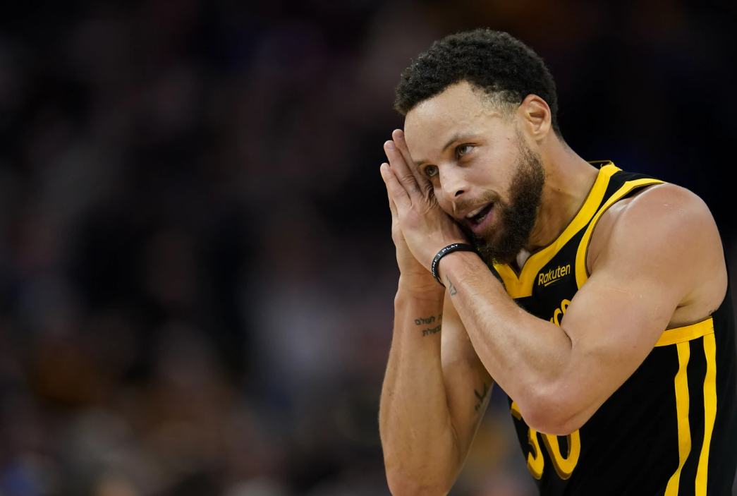 Golden State Warriors guard Stephen Curry reacts after scoring a 3-point basket against the Boston Celtics during overtime of an NBA game Tuesday, Dec. 19, 2023 in San Francisco.
