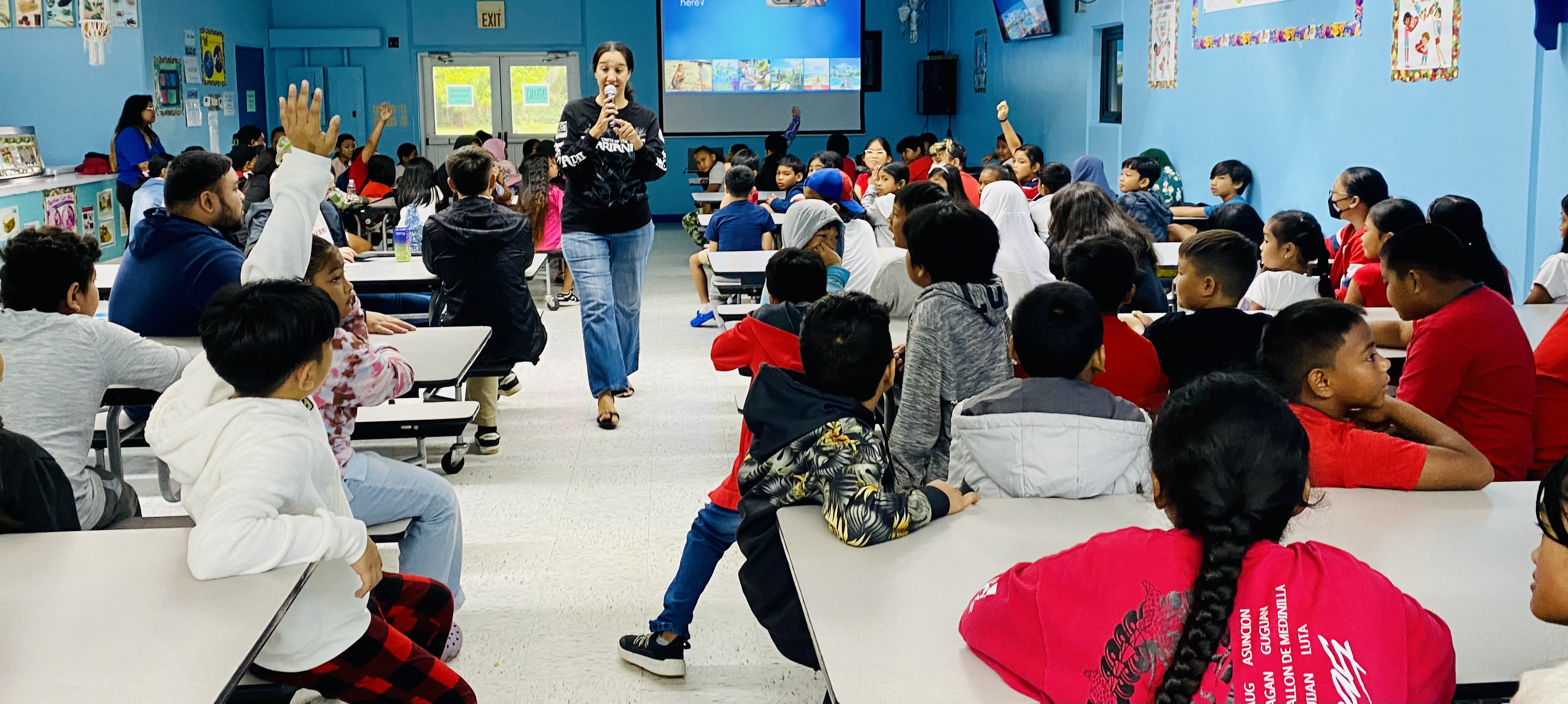 “Kind Kingfishers” of William S. Reyes Elementary School respond to a question from Marianas Tourism Education Council Board Member Catherine Perry during the educational outreach presentation of MTEC and the Marianas Visitors Authority on Dec. 18, 2023, at the school.