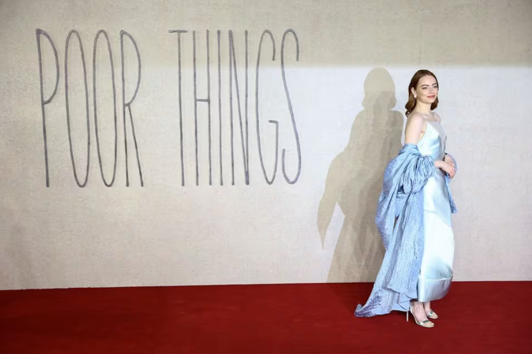 Cast member Emma Stone attends the red carpet for the premiere of the Venice Golden Lion-winning movie "Poor Things" at Barbican Centre in London, Britain, Dec. 14, 2023.