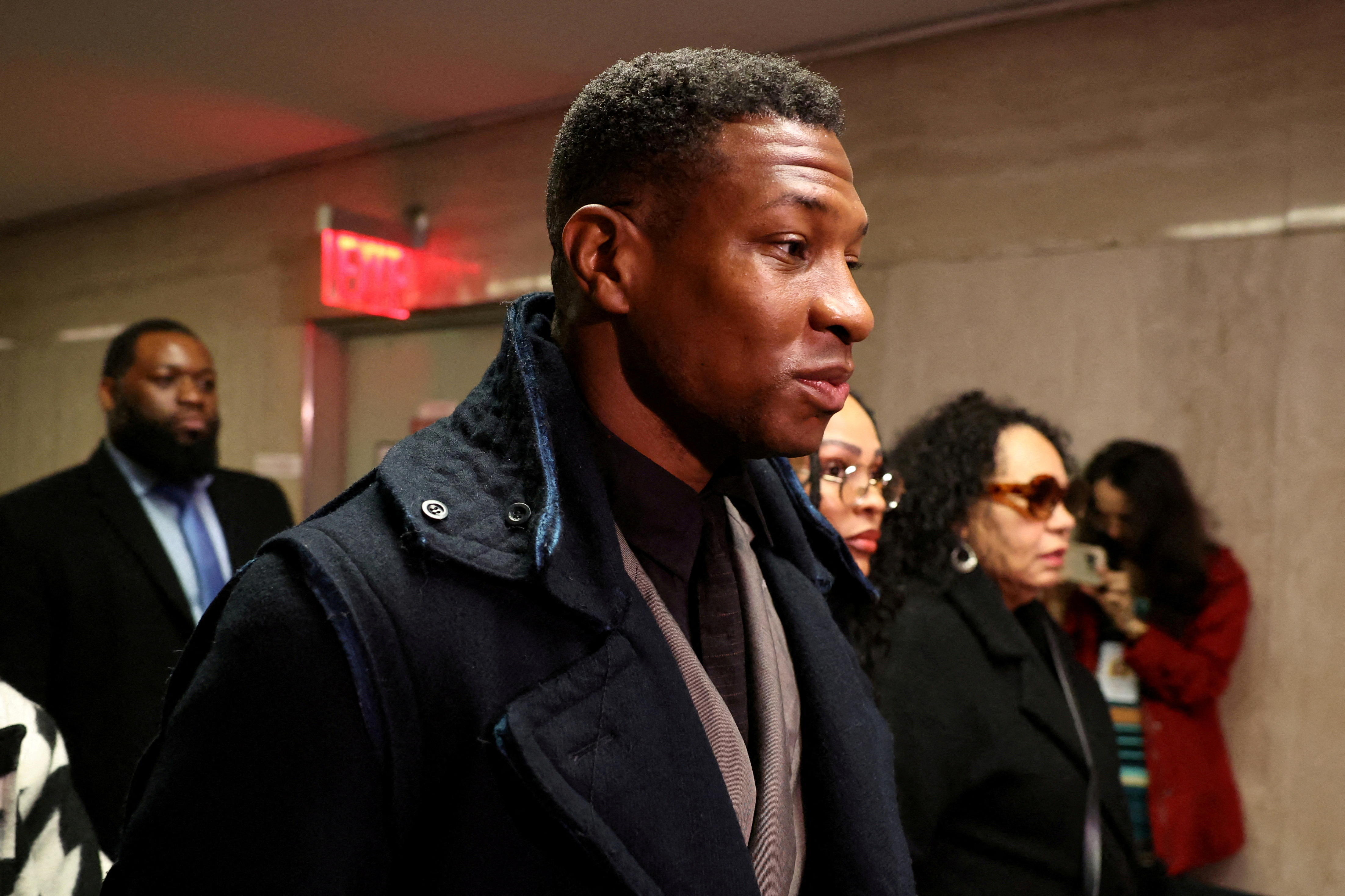 Actor Jonathan Majors arrives with Meagan Good for the jury selection in his assault and harassment case at Manhattan Criminal Court in New York City, U.S., December 18, 2023. 