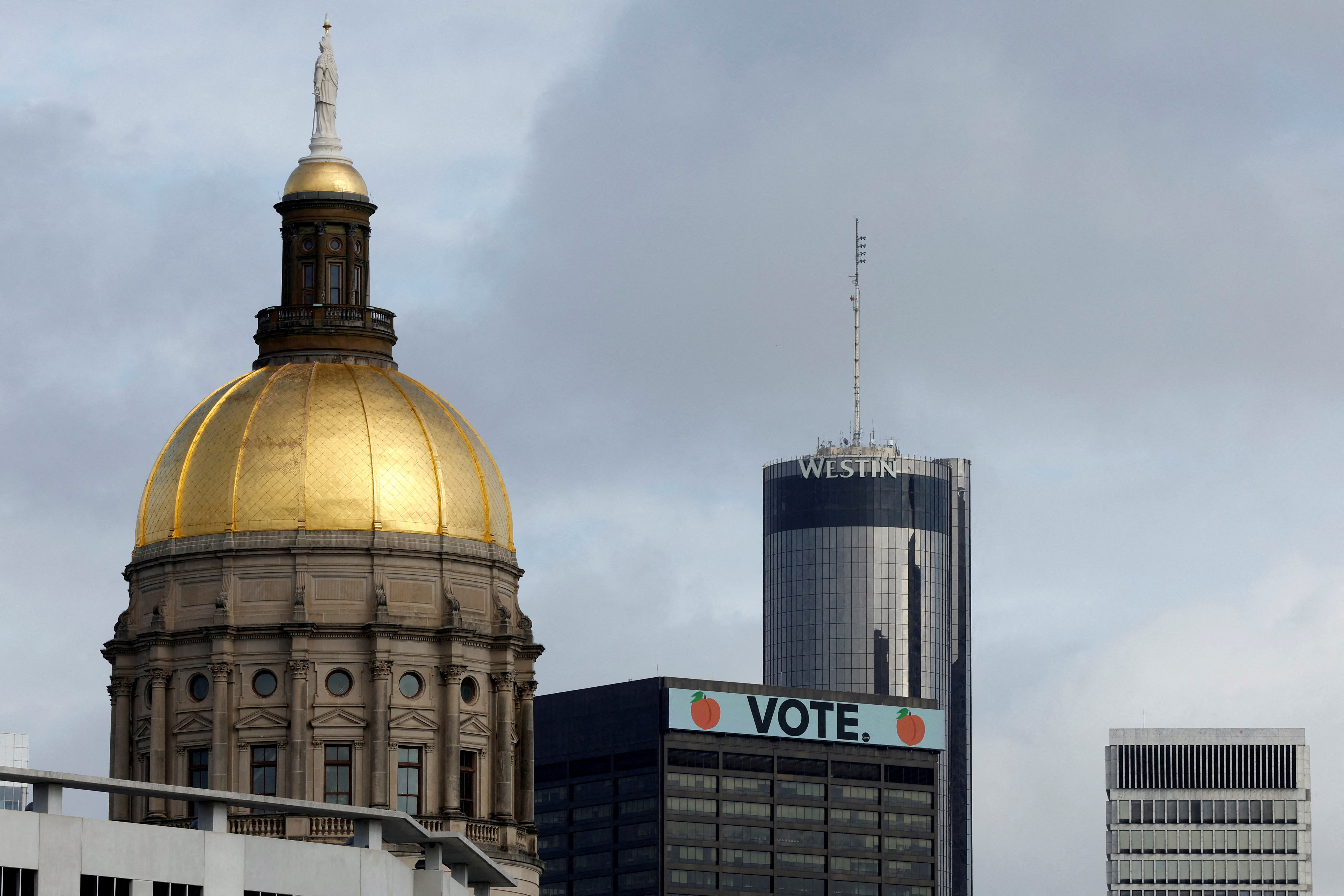 A general view of the Atlanta skyline includes the Georgia Capitol dome and a "Vote" sign atop the 100 Peachtree building, days ahead of nationally significant U.S. Senate and state governor elections in Atlanta, Georgia, U.S. November 6, 2022. 