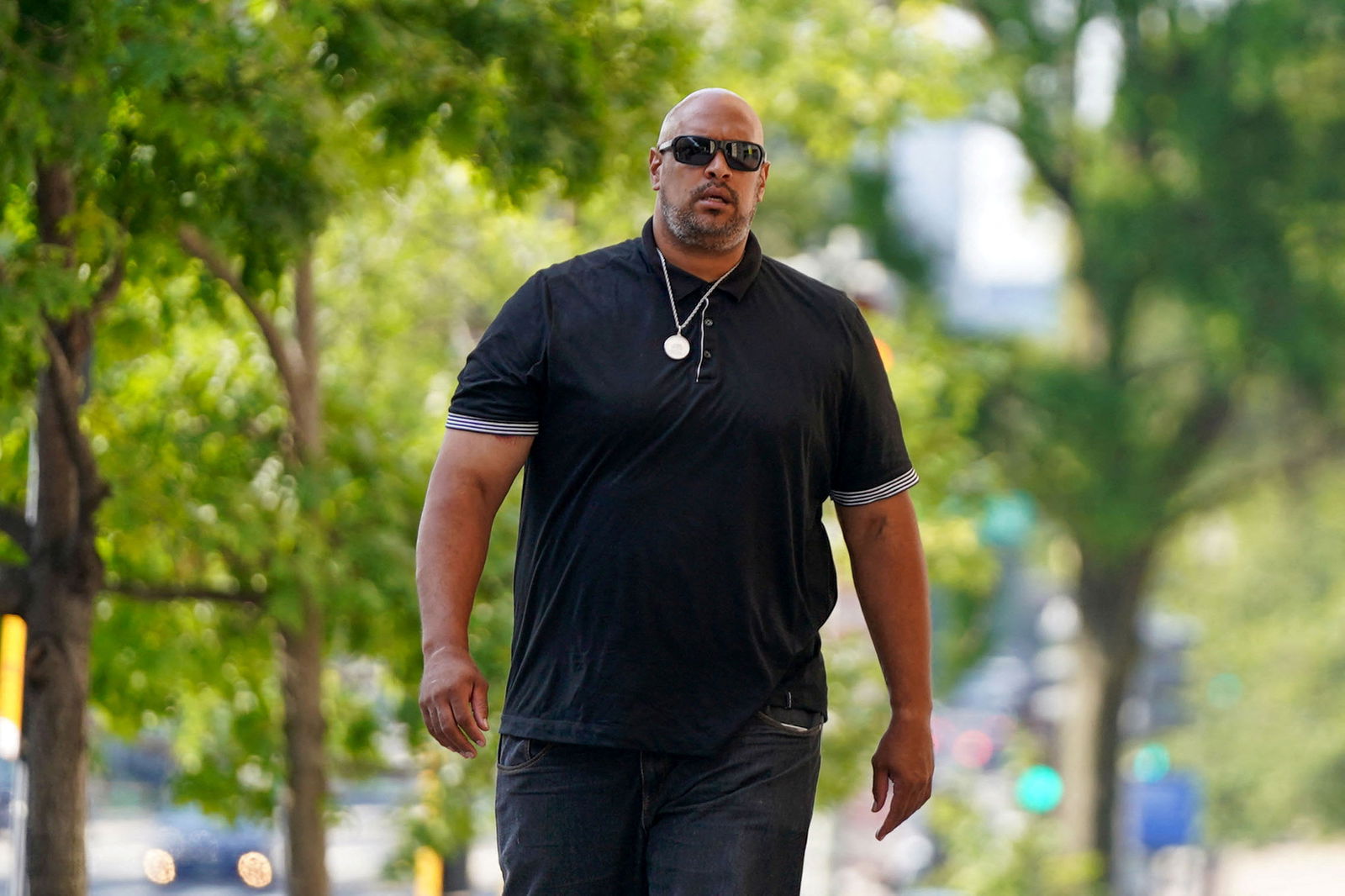 U.S. Capitol Police Officer Harry Dunn arrives at the U.S. District Court in Washington, U.S., August 11, 2023 before a hearing where former U.S. President Donald Trump's lawyers will urge a judge to give him more leeway to publicly share portions of the evidence that will be used in his trial on charges of plotting to overturn the 2020 election. 