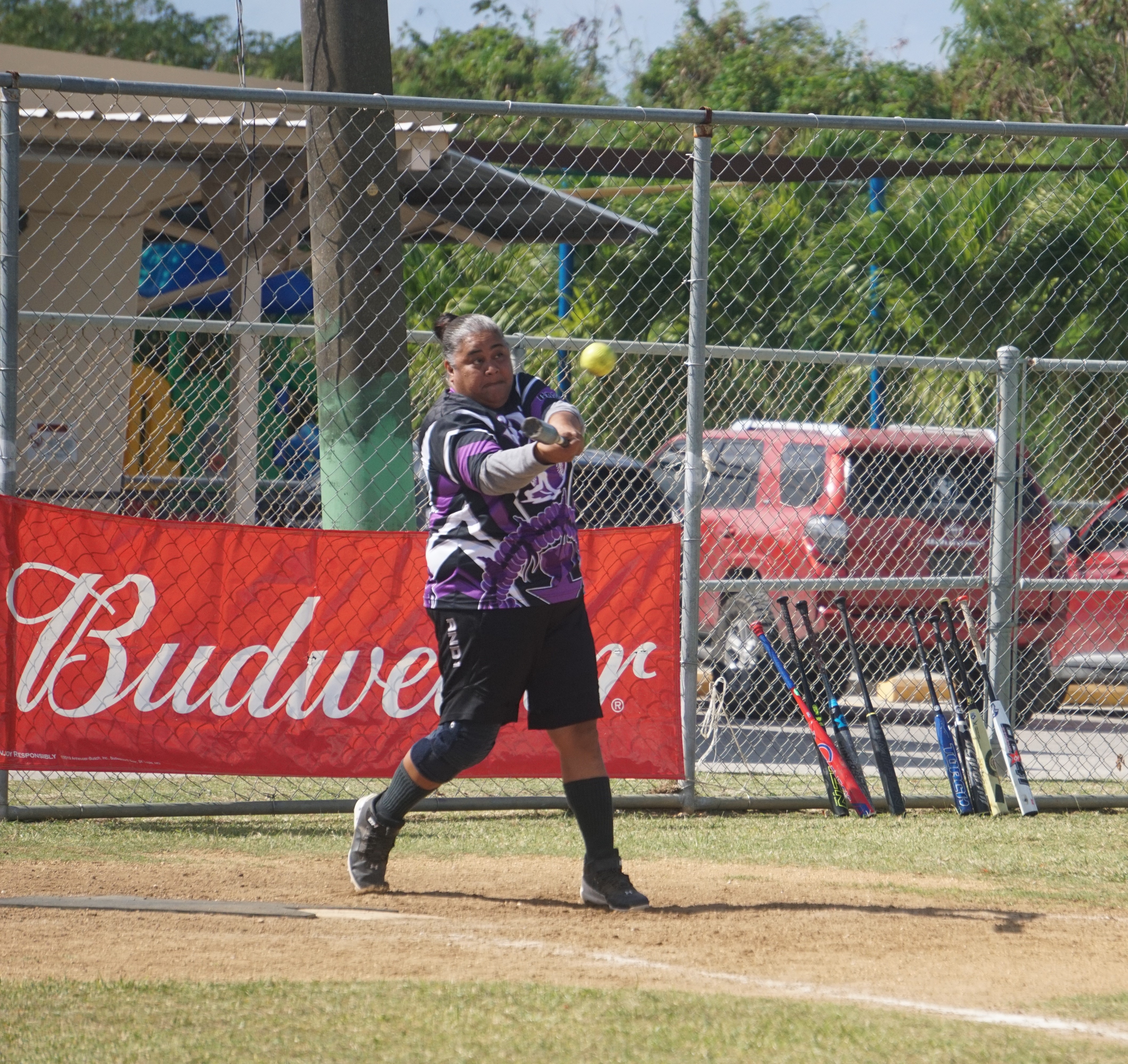 BDE's Jovie Omar connects a single during a ladies division game of the 2024 Budweiser Belau Amateur Softball Association League at the Dandan baseball field on Sunday.