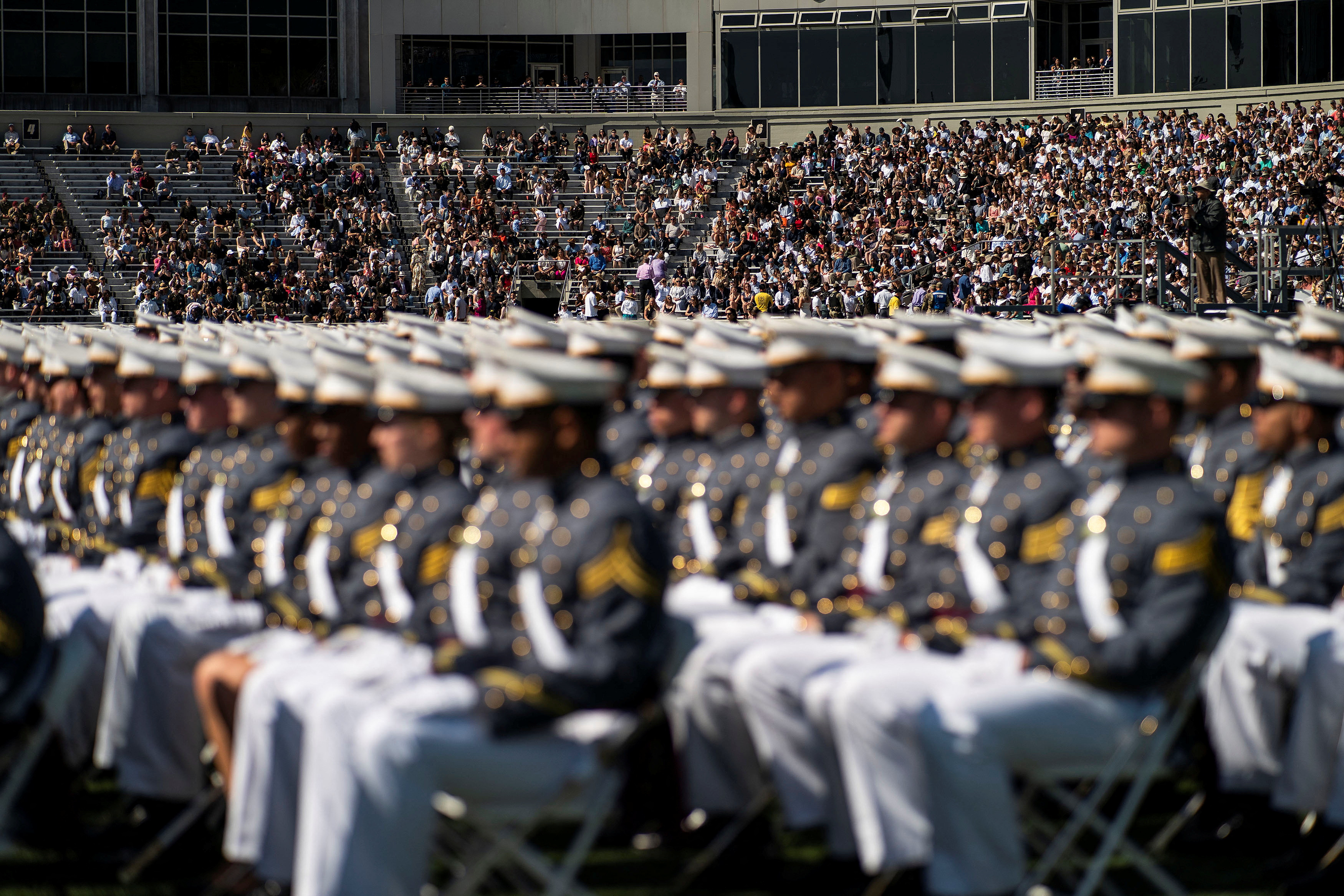 People attend the 2023 graduation ceremony at the United States Military Academy (USMA), at Michie Stadium in West Point, New York, U.S., May 27, 2023. 