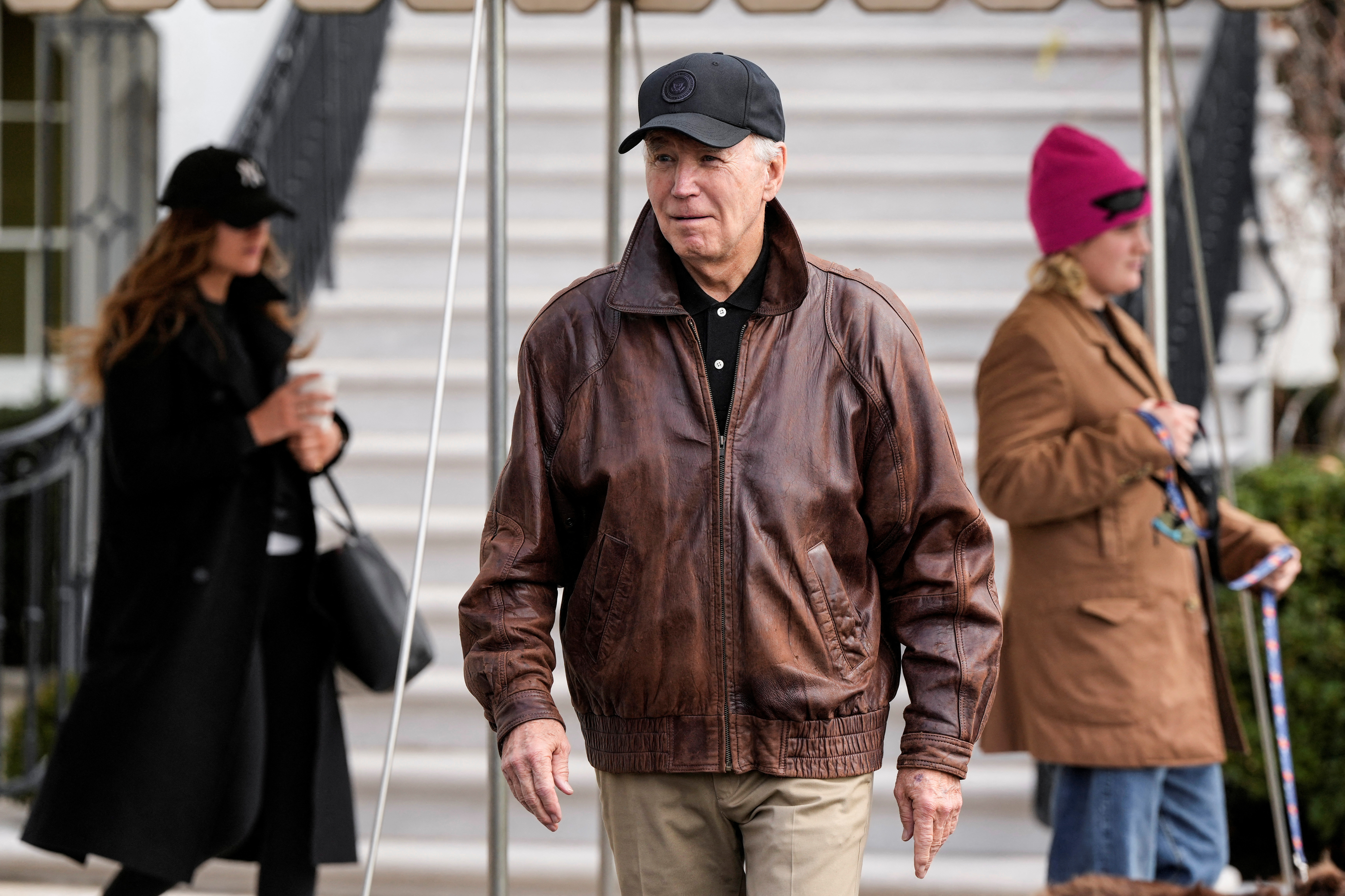 U.S. President Joe Biden walks to speak to the media before he departs for Camp David from the White House in Washington, U.S., January 13, 2024. 