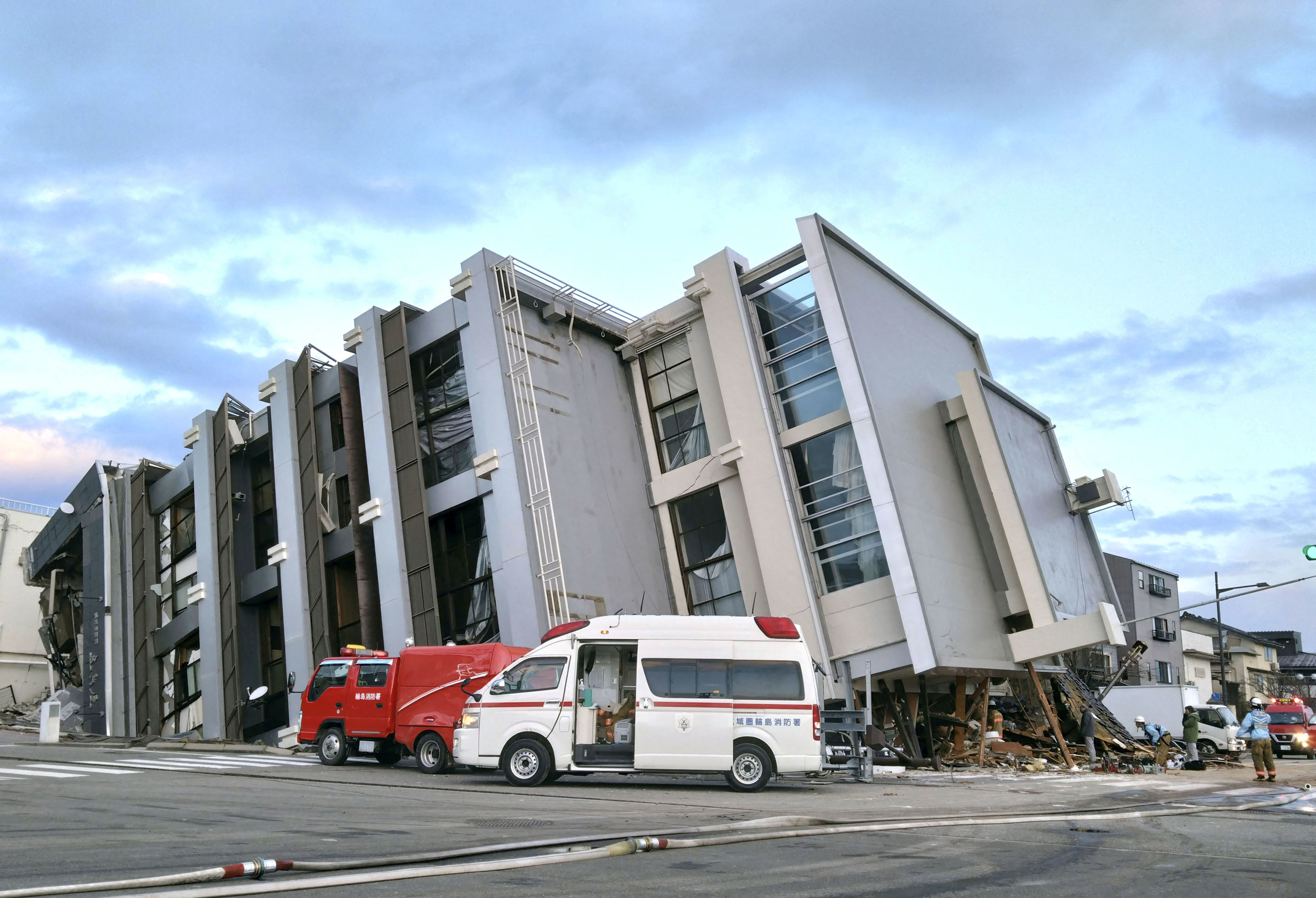 A collapsed building caused by an earthquake is seen in Wajima, Ishikawa prefecture, Japan January 2, 2024, in this photo released by Kyodo. 