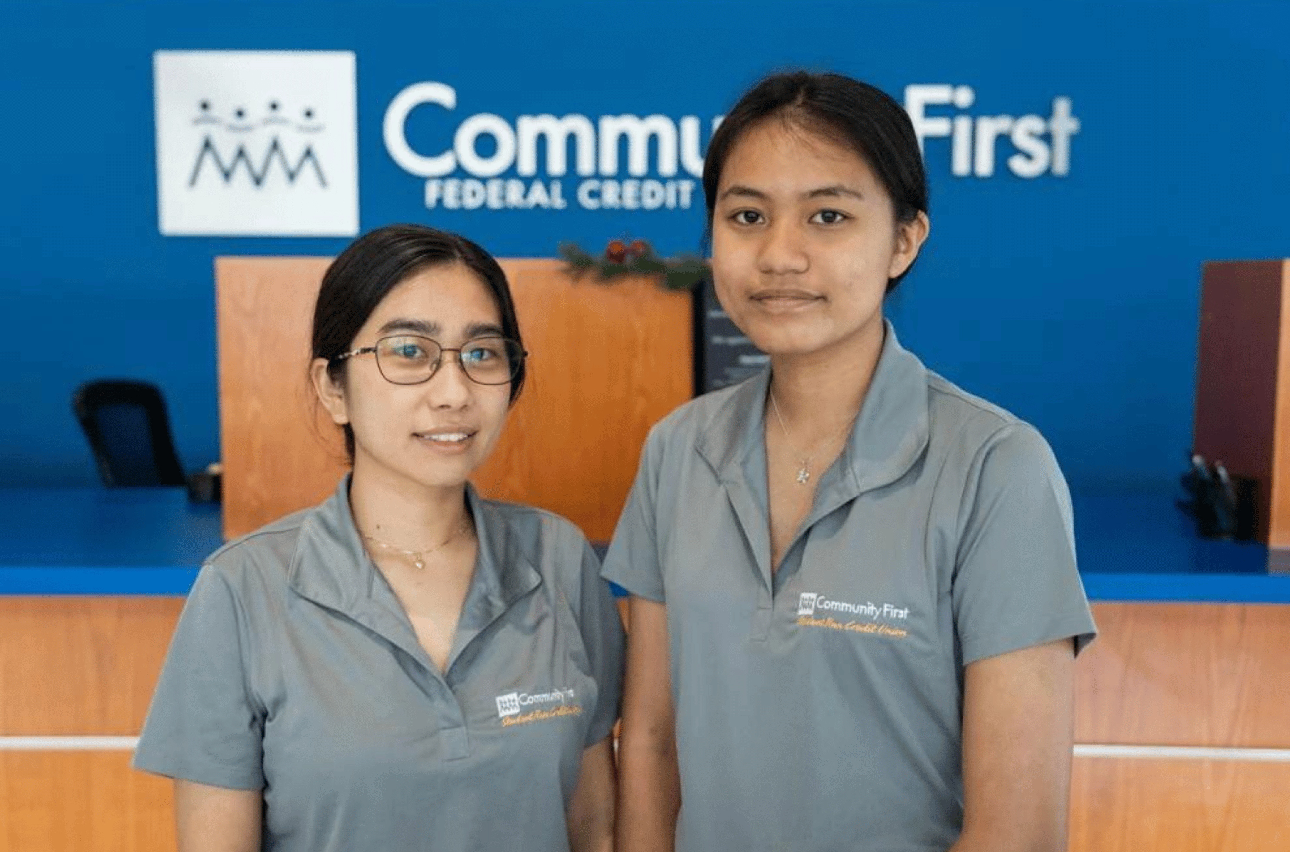 Community First Guam Federal Credit Union selected Jovelyn Concepcion, left, a University of Guam student, and Lana Paulino, a Guam Community College student, for the financial institution's internship program.