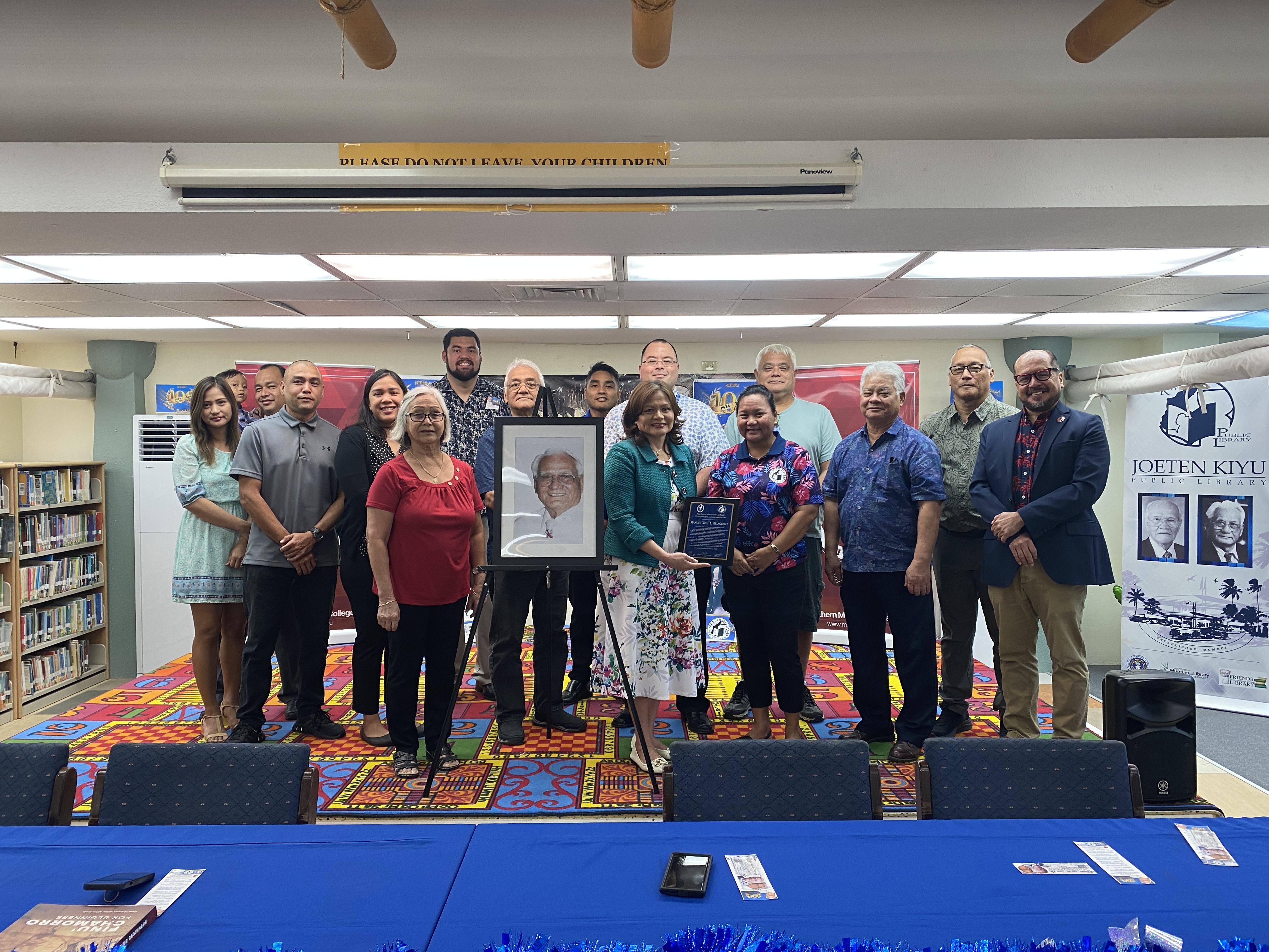 Some of the descendants of Manuel “Kiyu” Seman Villagomez pose for a photo with Gov. Arnold I. Palacios, Joeten-Kiyu Public Library Director Erlinda Naputi, House Speaker Edmund Villagomez, and Northern Marianas College President Galvin Deleon Guerrero during a ceremony at JKPL to celebrate Kiyu’s 100th birthday.