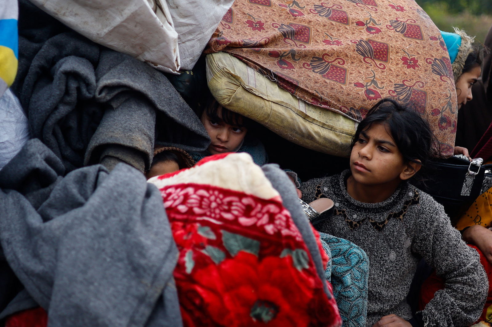 Palestinians fleeing Khan Younis, due to the Israeli ground operation, move towards Rafah, amid the ongoing conflict between Israel and the Palestinian Islamist group Hamas, in the southern Gaza Strip, January 27, 2024. 