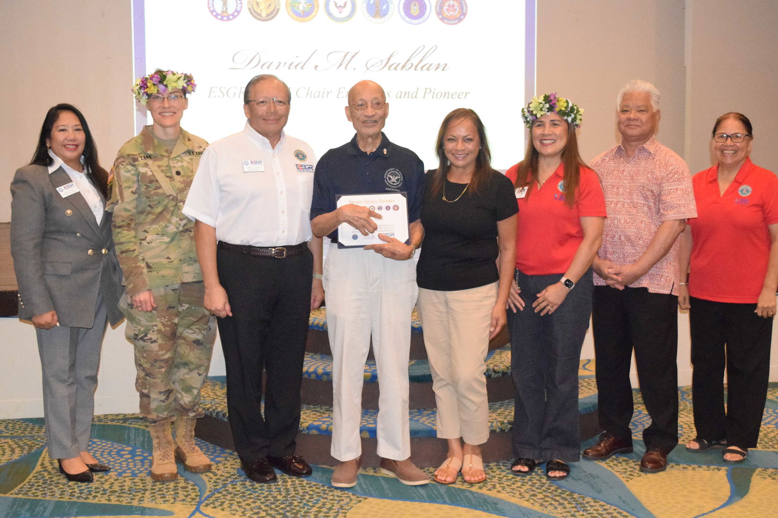 ESGR-CNMI Chair Emeritus and Pioneer David M. Sablan, fourth left, with his son, David Sablan Jr., third left, daughter, Patty Sablan, fourth right, Gov. Arnold I. Palacios, second right, National ESGR Chief for the Northeast and West LTC Agatha Zana, second left, ESGR Guam-CNMI State Committee Chair Cathy Gogue, third right, ESGR-CNMI Area Chair Dr. Rita A. Sablan, right, and Ombudsman Joann Aquino, left.