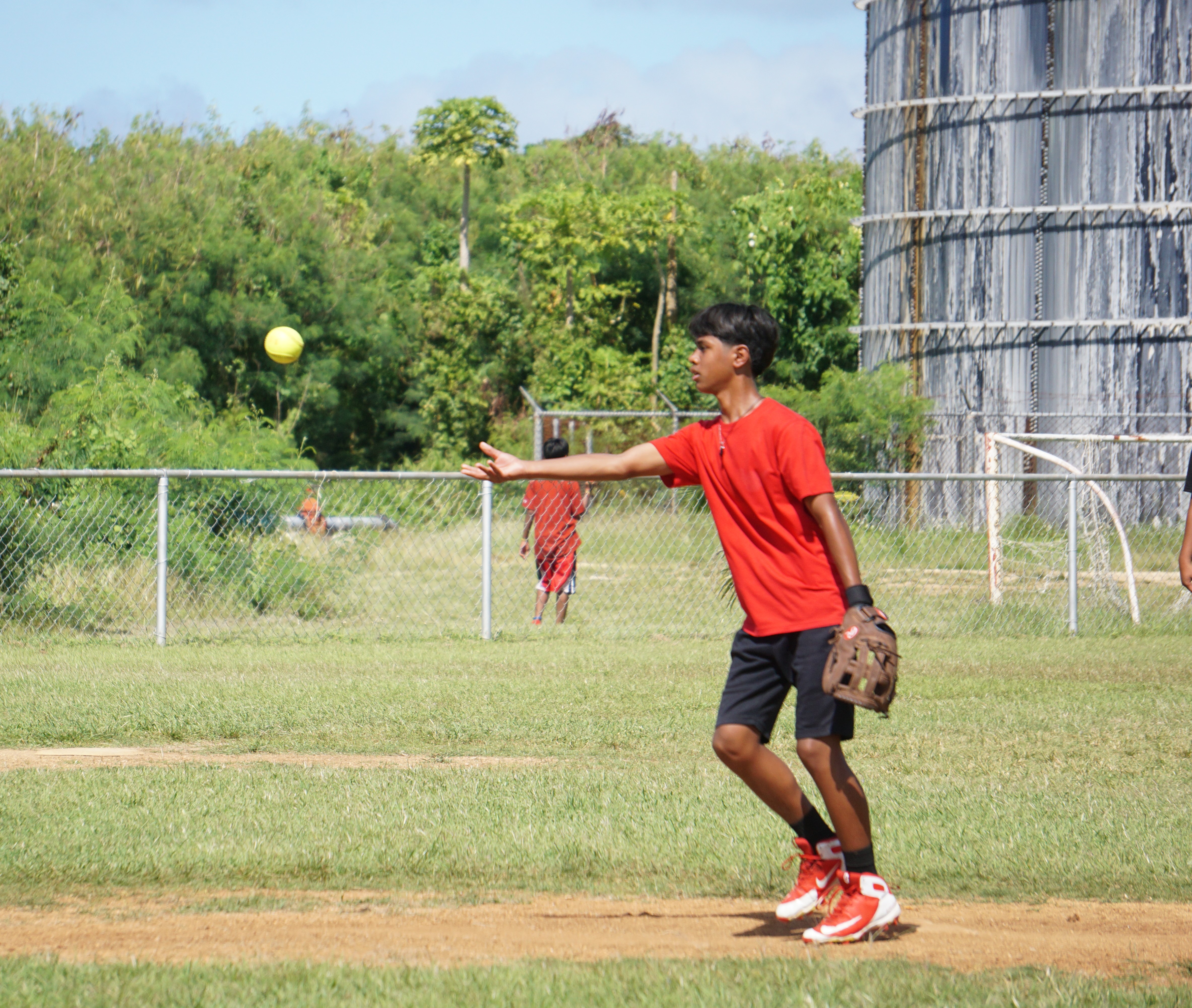Dandan Middle School's Peter Camacho pitches against Tanapag Middle School during a boys middle school division game of the SBL-PSS Interscholastic Softball League SY23-24 at the Dandan baseball field on Saturday.