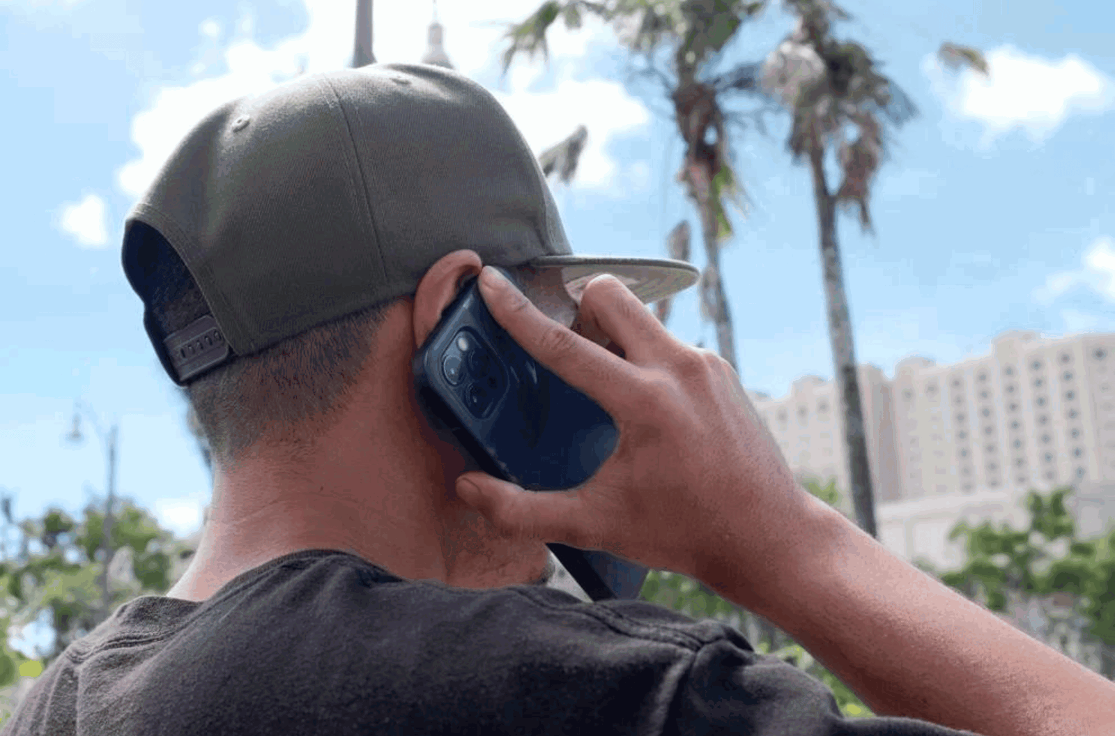 A Guam resident uses a cellphone in Tumon on Friday, Sept. 15, 2023.