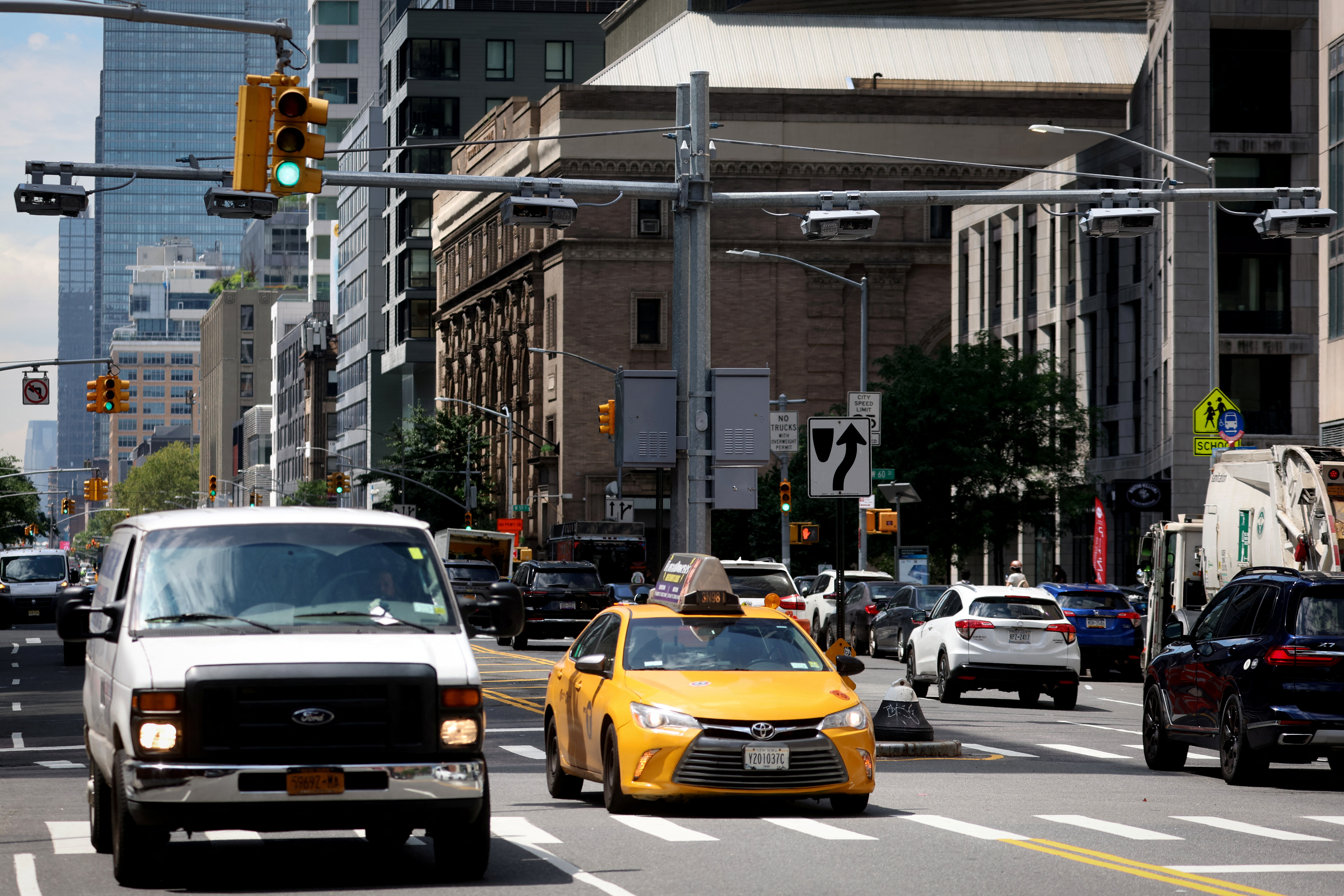A newly installed set of tolling mechanisms hang over West End Avenue at 61st Street in Manhattan, ahead of New York City’s planned congestion pricing program to charge drivers for entering the central business district as early as next year, in New York, U.S., July 21, 2023. 