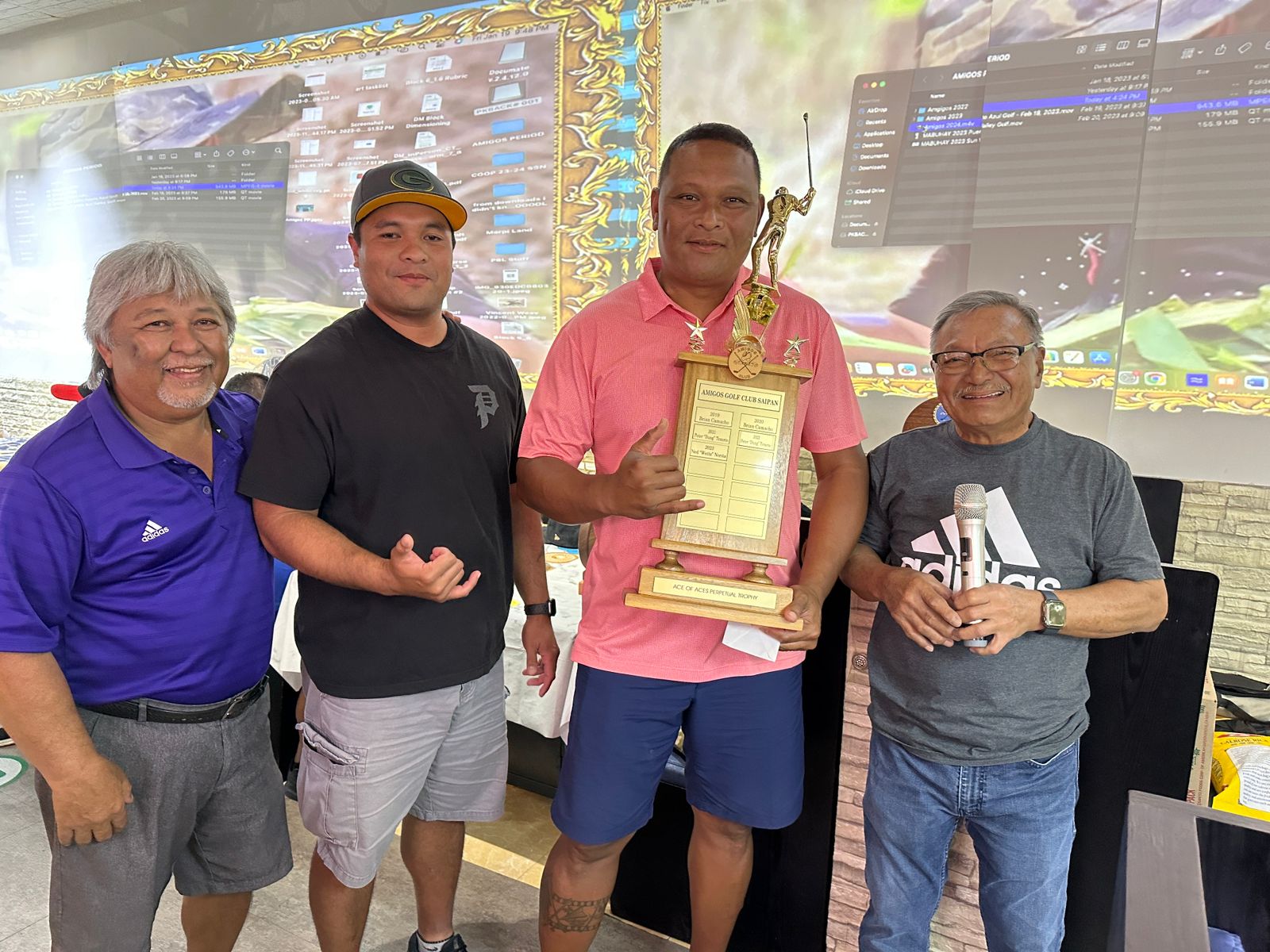Ned Norita, 2nd right, holds the Amigos Golf Club 2023 Ace of Aces trophy as he poses for a photo with Sixtus Aquino and the club officers during the awards banquet at Party & Beyond Restaurant.