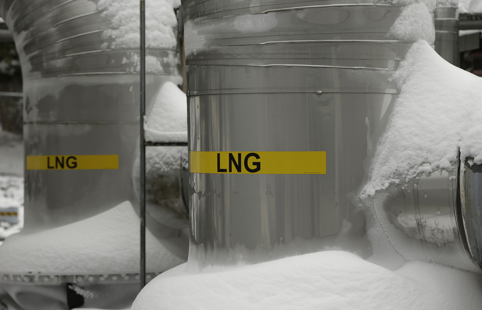 Snow covered transfer lines are seen at the Dominion Cove Point Liquefied Natural Gas (LNG) terminal in Lusby, Maryland March 18, 2014. 