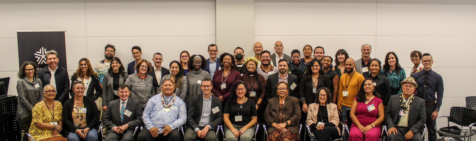 The participants of the U.S. Territory Summit in New York City pose for a group photo.