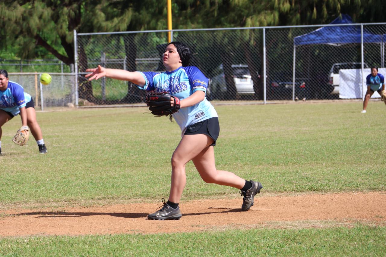 The Lady Blue Jays' Angel Deleon Guerrero pitches against  Lady SUFA during a ladies division game of the 2024 Budweiser Belau Amateur Softball Association League at the Dandan baseball field. 