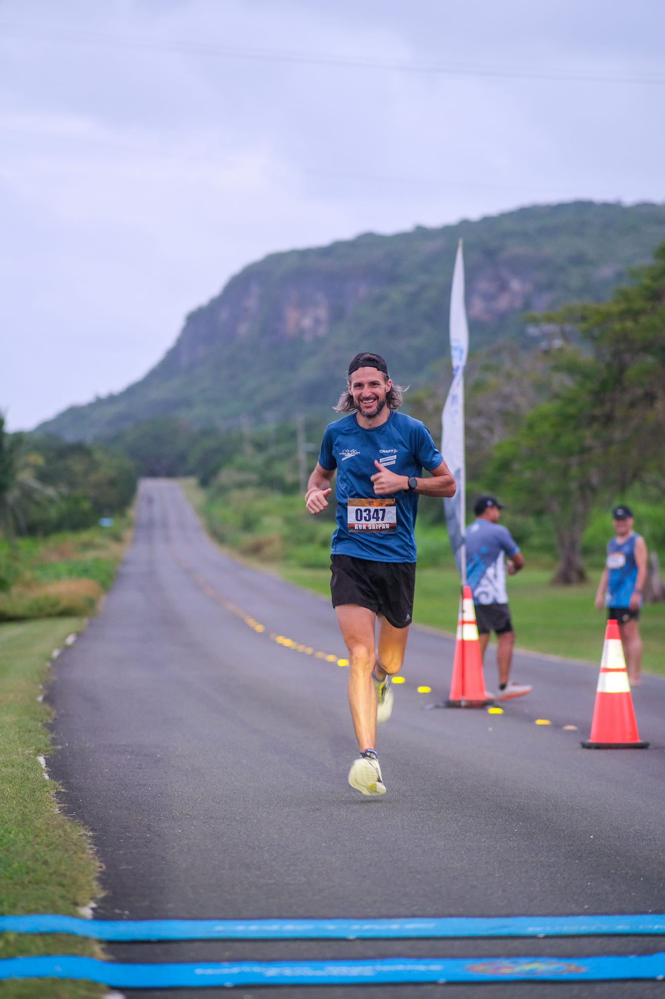 Martin Hess finishes overall first on day 3 of the 2nd Annual Run Saipan Trinity in Marpi on Monday.