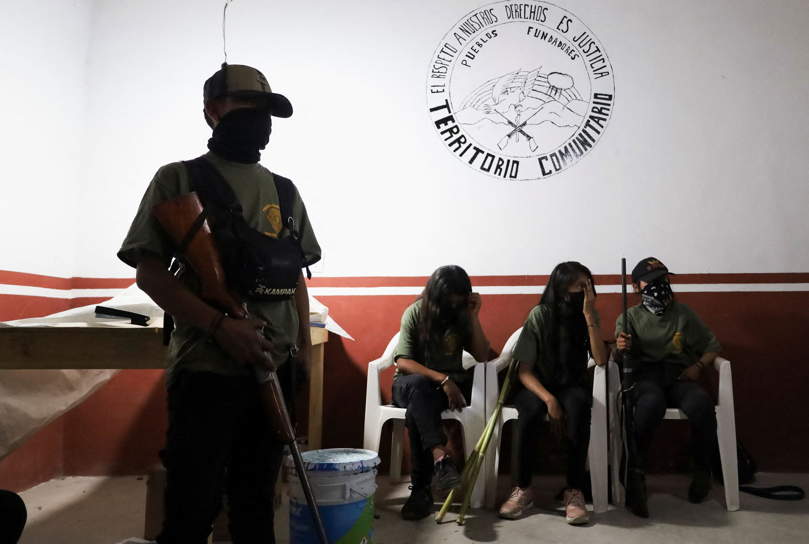 Children hold rifles before a ceremony to join the ranks of the community police, few days after an armed group abducted four people from the community, in Ayahualtempa, Guerrero state, Mexico, January 24, 2024. 