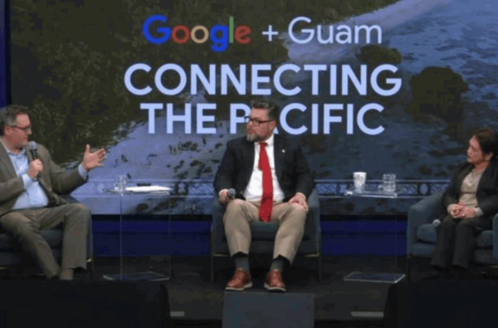 Consultant Mathew Herman, left, Brian Quigley, vice president of Global Network Infrastructure at Google, center, and Gov. Lou Leon Guerrero are seen Thursday, Jan. 18, 2024, at a virtual press conference regarding the Central Pacific Connect Initiative. 