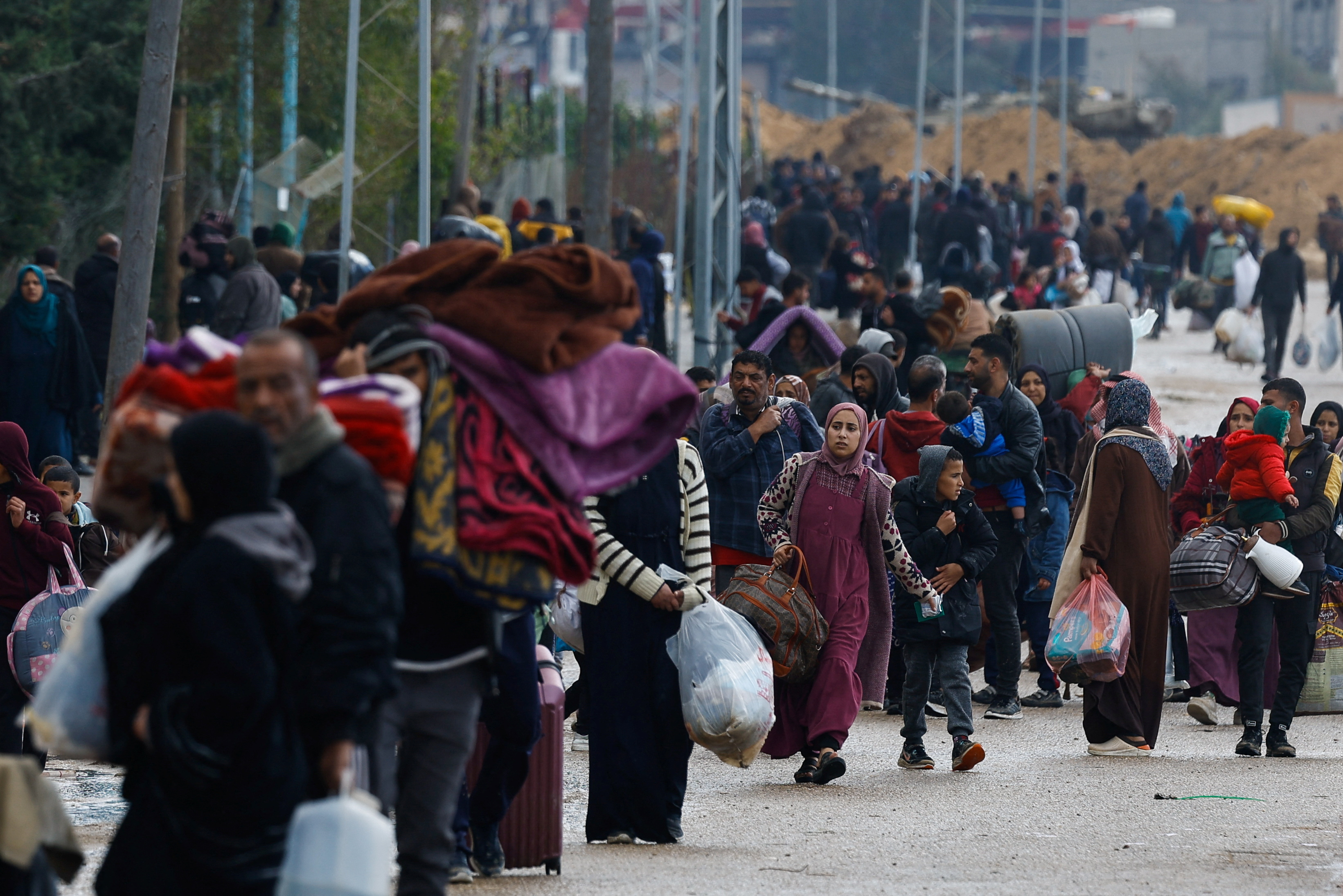 Palestinians fleeing Khan Younis, due to the Israeli ground operation, move towards Rafah, amid the ongoing conflict between Israel and the Palestinian Islamist group Hamas, in the southern Gaza Strip, January 29, 2024. 
