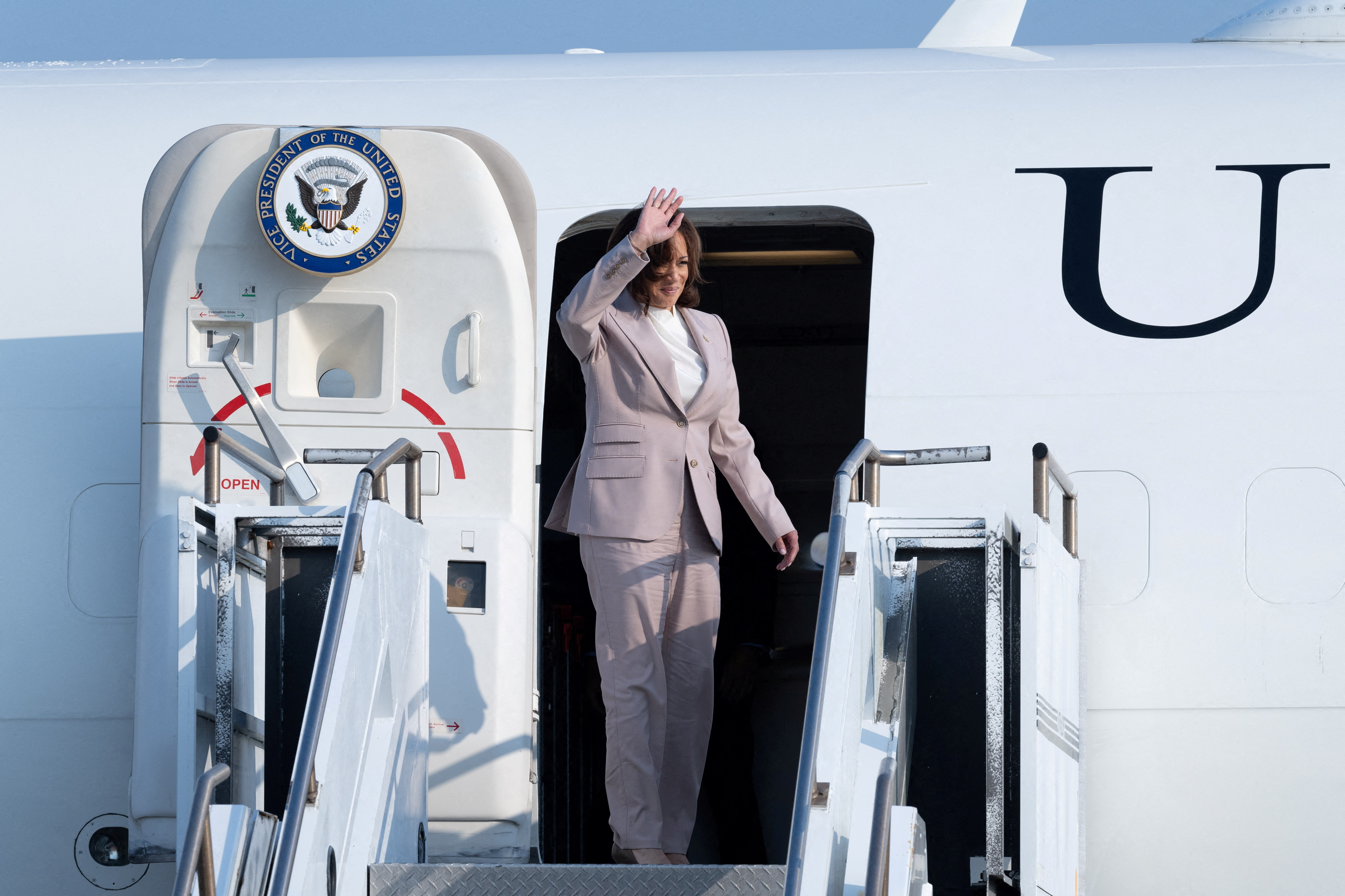 U.S. Vice President Kamala Harris gestures as she boards Air Force Two after attending the 43rd ASEAN Summit at the Soekarno-Hatta International Airport in Tangerang, Indonesia on September 7, 2023. 