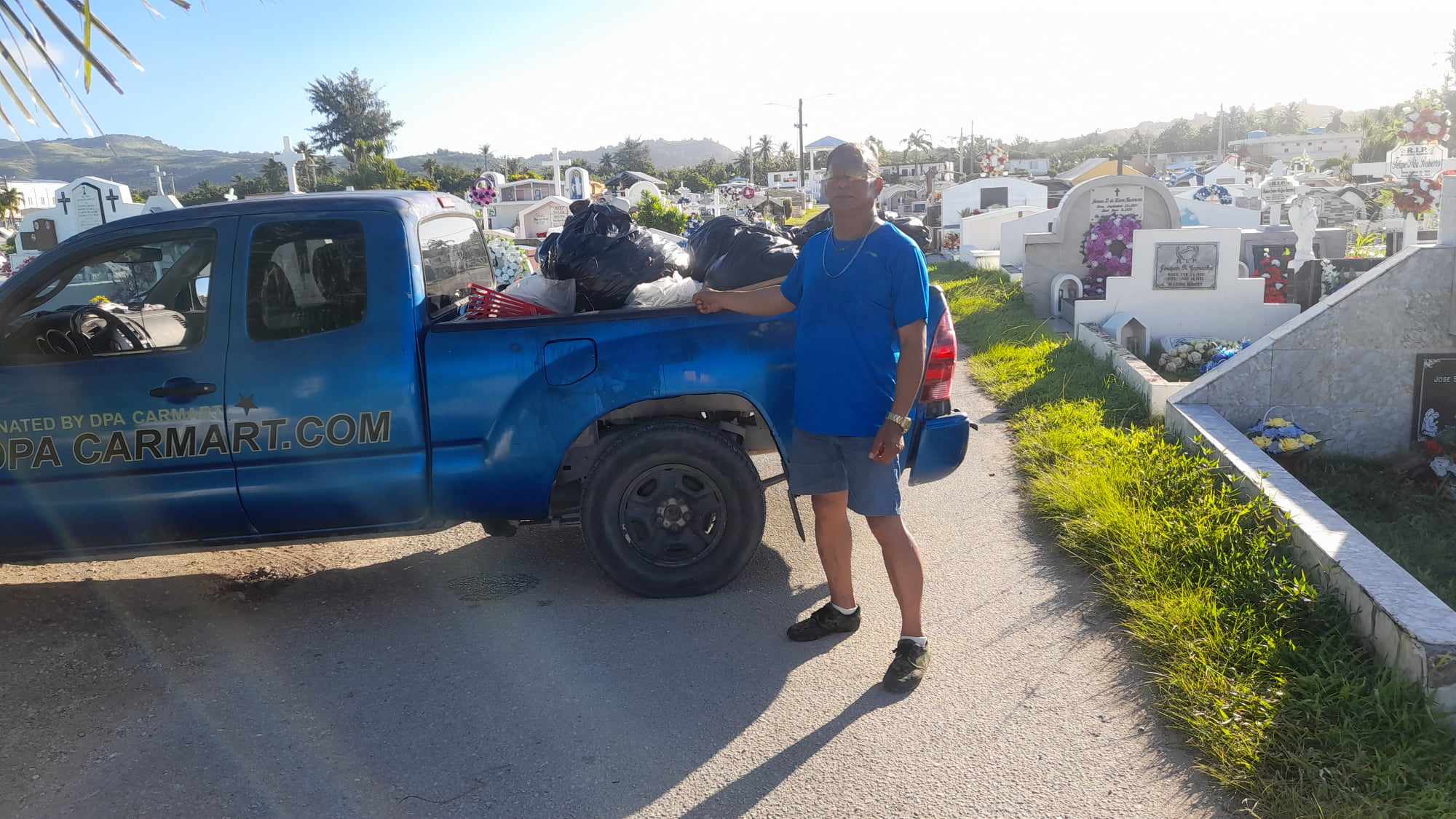 On Christmas Eve, community volunteer Max Aguon was at the Chalan Kanoa cemetery to remove illegally dumped household trash.