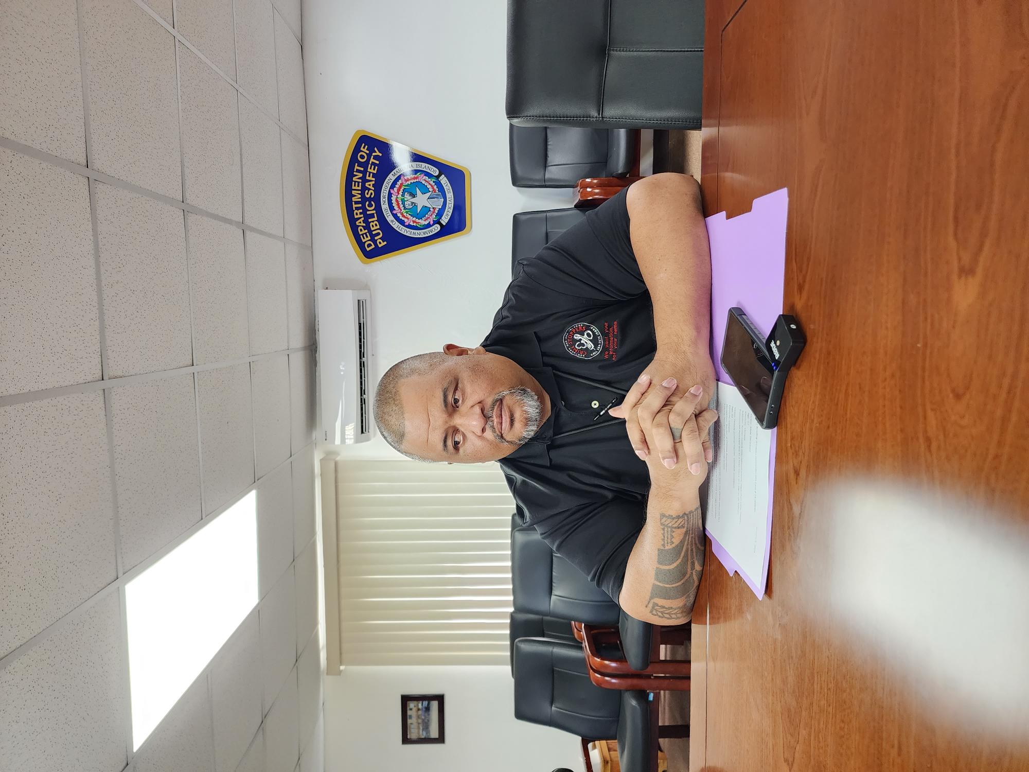 The Department of Public Safety's public information officer, Police Sgt. Fred Sato, conducts a press conference on Friday.