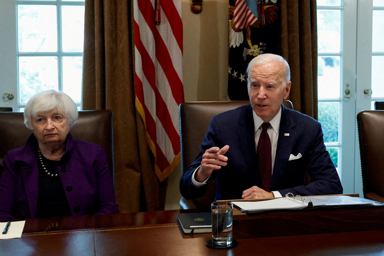 U.S. President Joe Biden speaks next to U.S. Treasury Secretary Janet Yellen during a cabinet meeting in the Cabinet Room of the White House in Washington, U.S., June 6, 2023. 