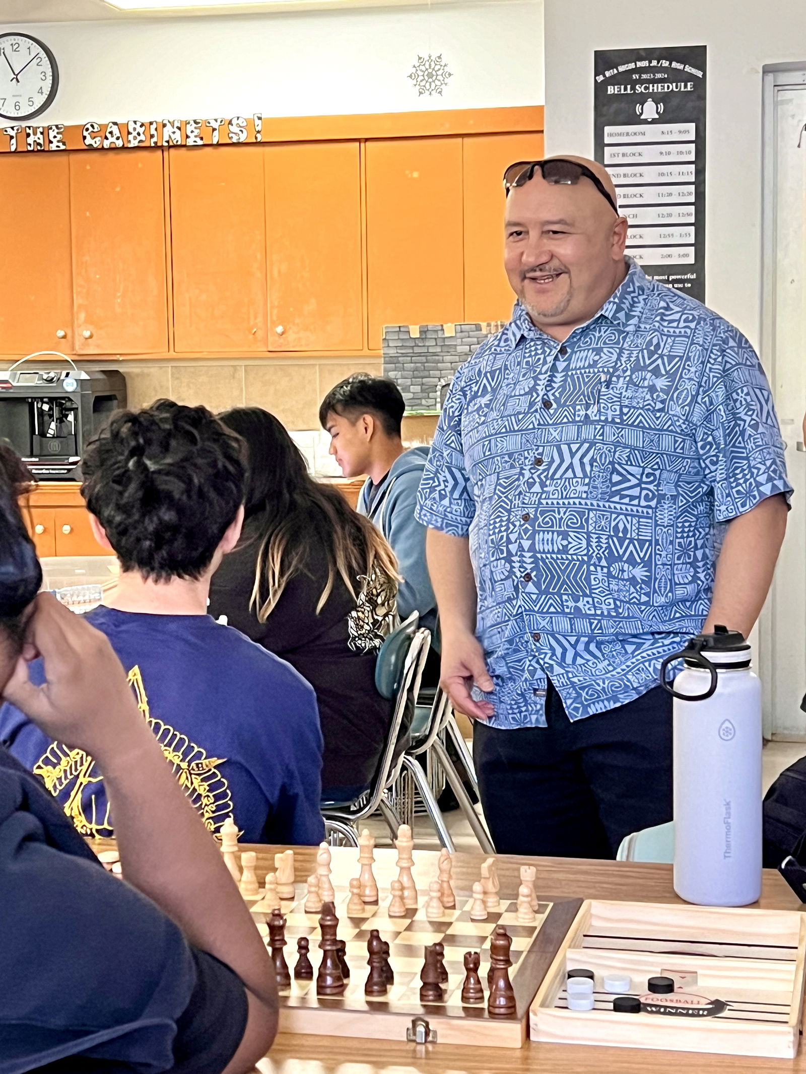 Dr. Lawrence F. Camacho talks with students of Dr. Rita Hocog Inos Junior-Senior High School.