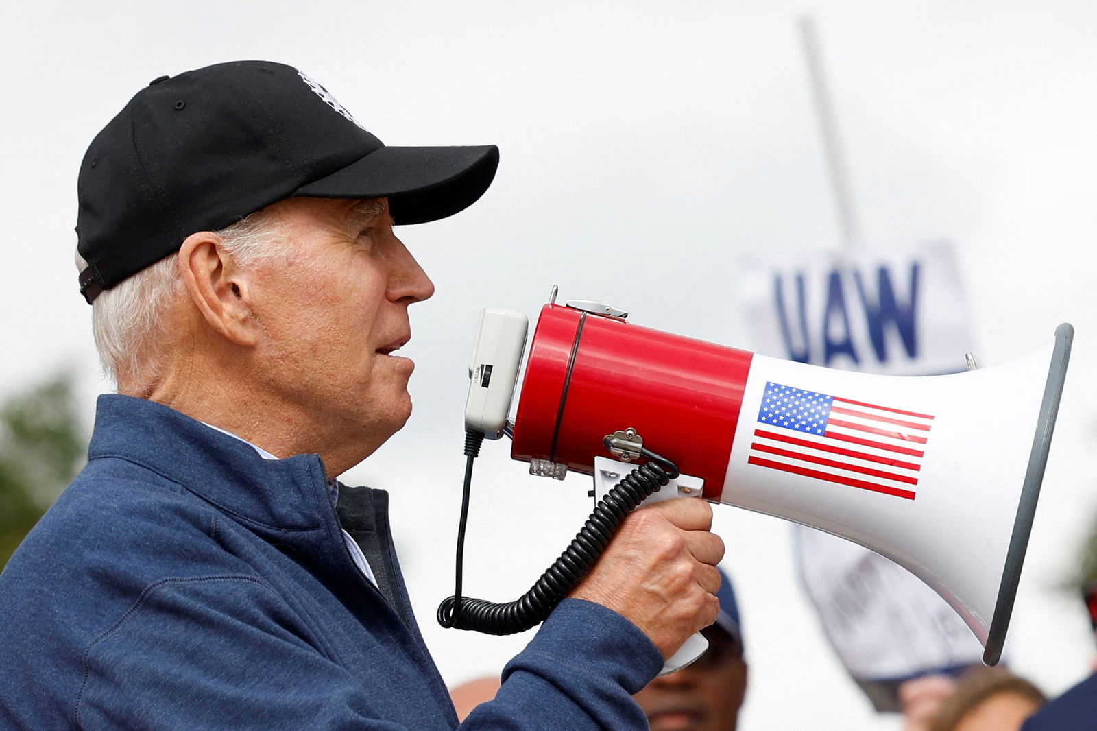 U.S. President Joe Biden joins striking members of the United Auto Workers (UAW) on the picket line outside the GM's Willow Run Distribution Center, in Belleville, Wayne County, Michigan, U.S., September 26, 2023. 
