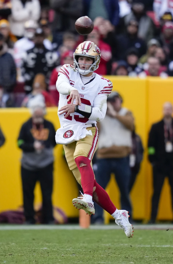 San Francisco 49ers quarterback Brock Purdy throws a pass during the second half of an NFL game against the Washington Commanders, Sunday, Dec. 31, 2023 in Landover, Md. San Francisco won 27-10.