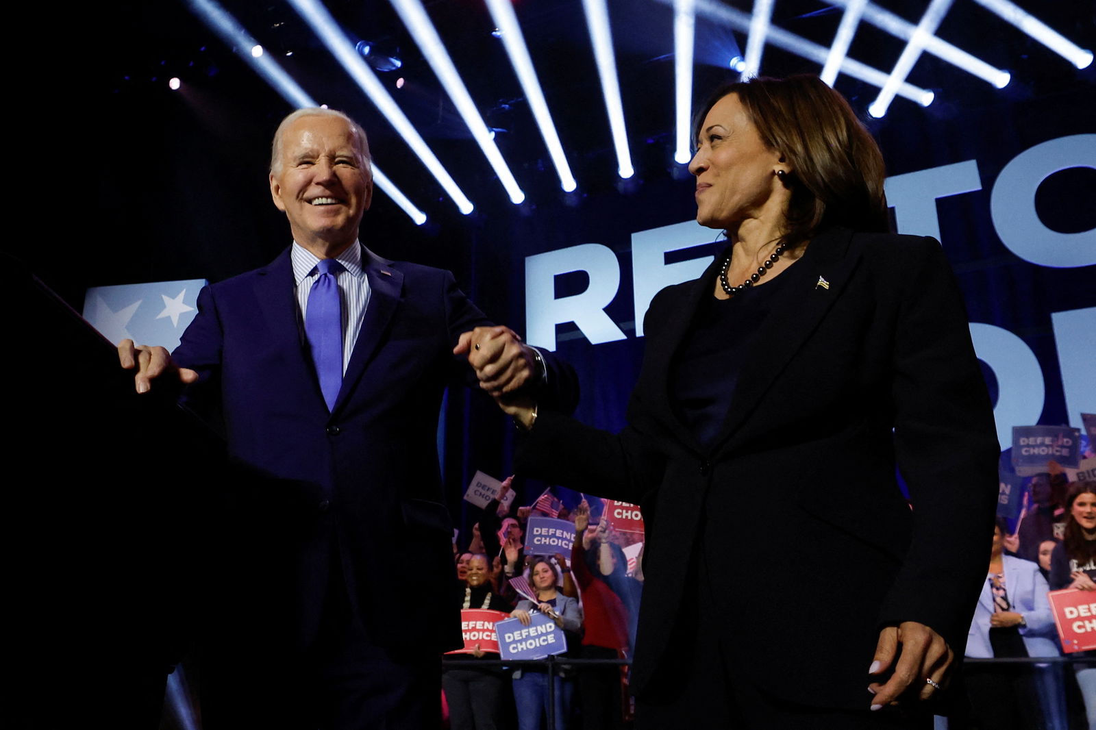 U.S. President Joe Biden and Vice President Kamala Harris attend a campaign event focusing on abortion rights at the Hylton Performing Arts Center, in Manassas, Virginia, U.S., January 23, 2024. 
