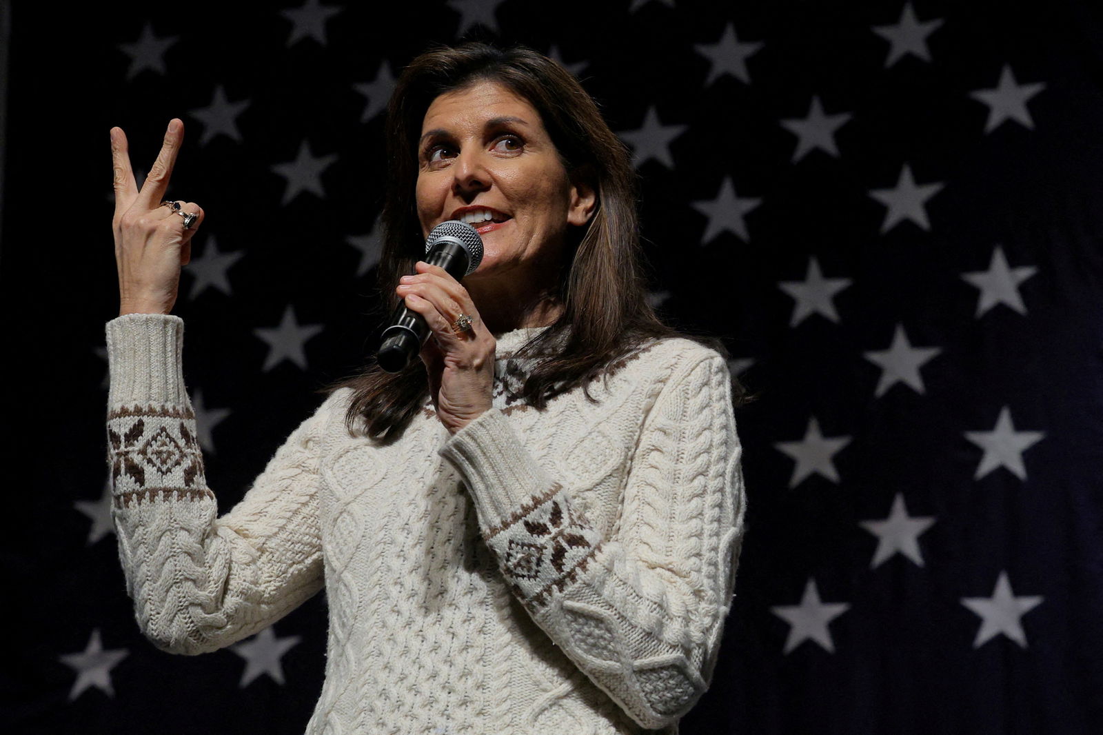 Republican presidential candidate and former U.S. Ambassador to the United Nations Nikki Haley gestures, indicating a two-person race after opponent Florida Governor Ron DeSantis suspended his campaign, during a Get Out the Vote campaign rally ahead of the New Hampshire primary election in Exeter, New Hampshire, U.S., January 21, 2024. 