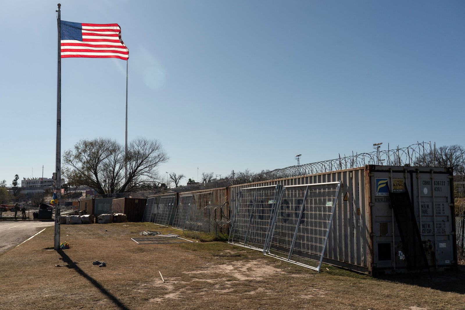Shipping containers and concertina wires are used as border fence on the bank of the Rio Grande river in Eagle Pass, Texas, U.S., January 17, 2024. 