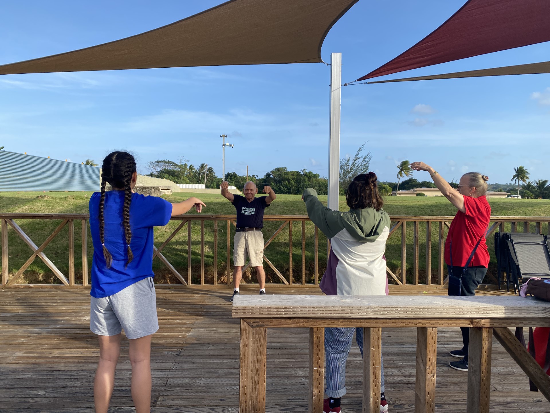 NMC instructor Barry Wicksman leads a tai chi demonstration at Health Night.