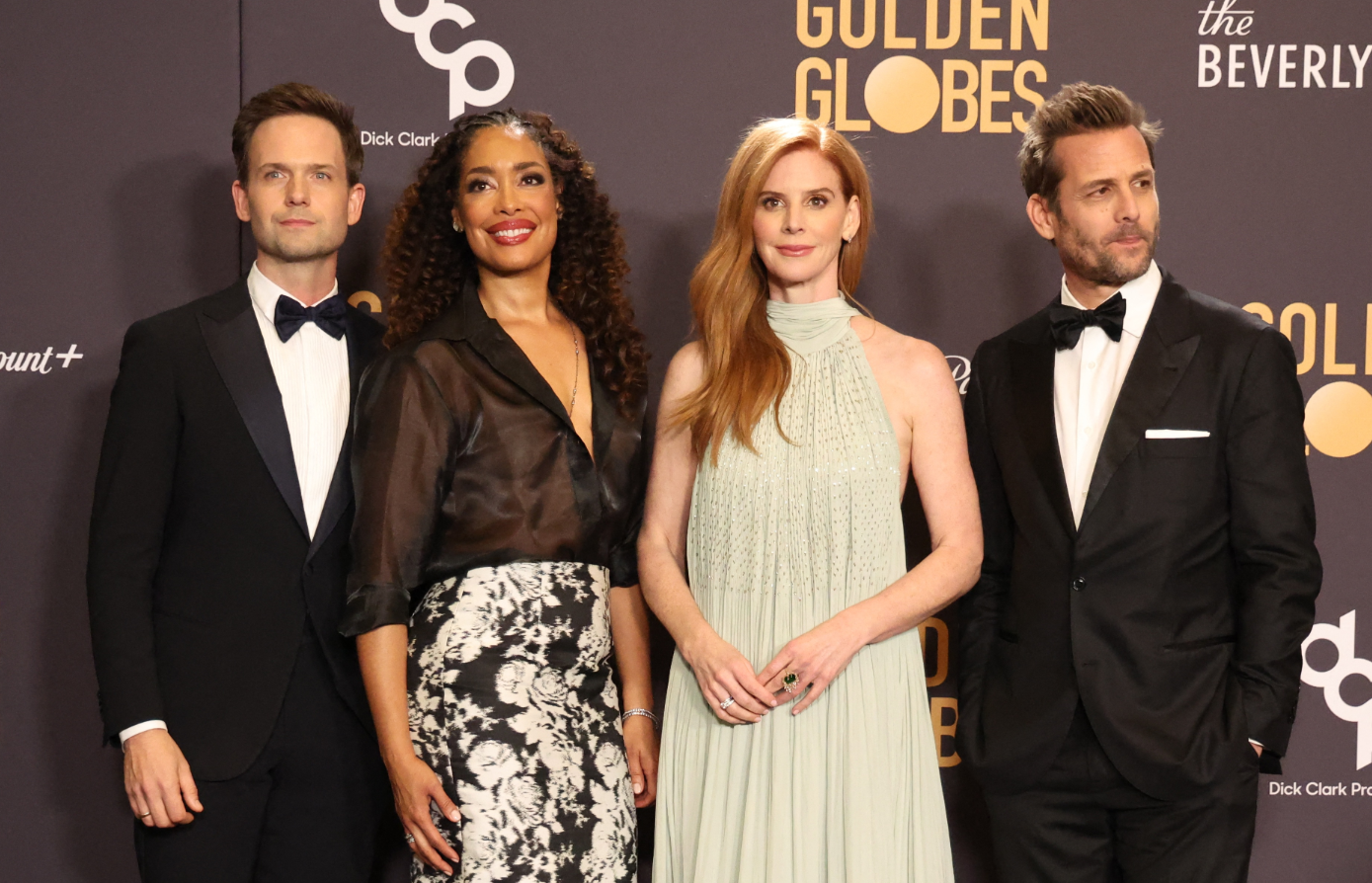 From right, Gabriel Macht, Sarah Rafferty, Gina Torres and Patrick J. Adams pose at the 81st Annual Golden Globe Awards in Beverly Hills, California, Jan. 7, 2024.