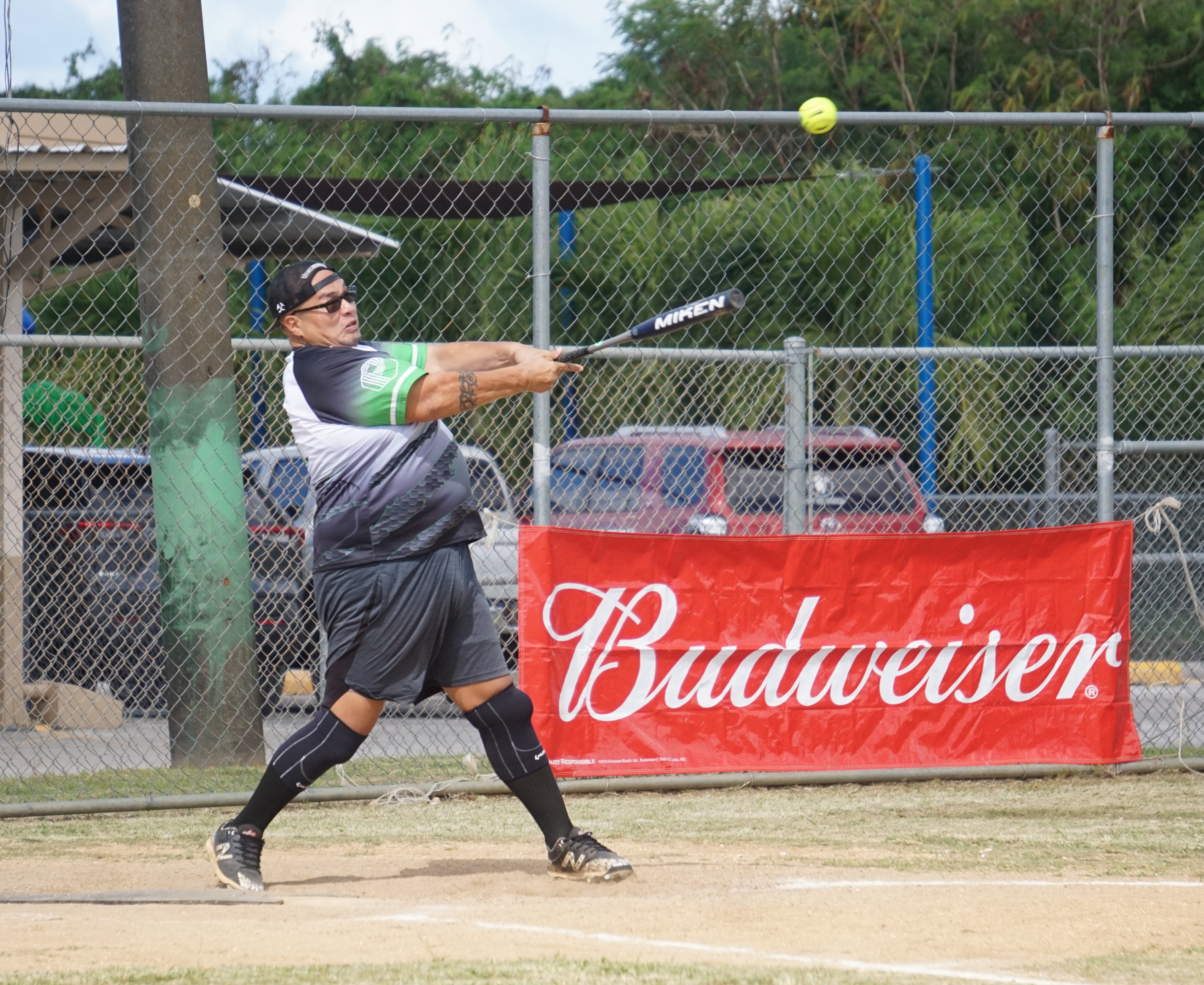 Tokahao's David Attao connects a single during an opening game of the 2024 Budweiser Belau Amateur Softball Association League at the Dandan baseball field on Sunday.