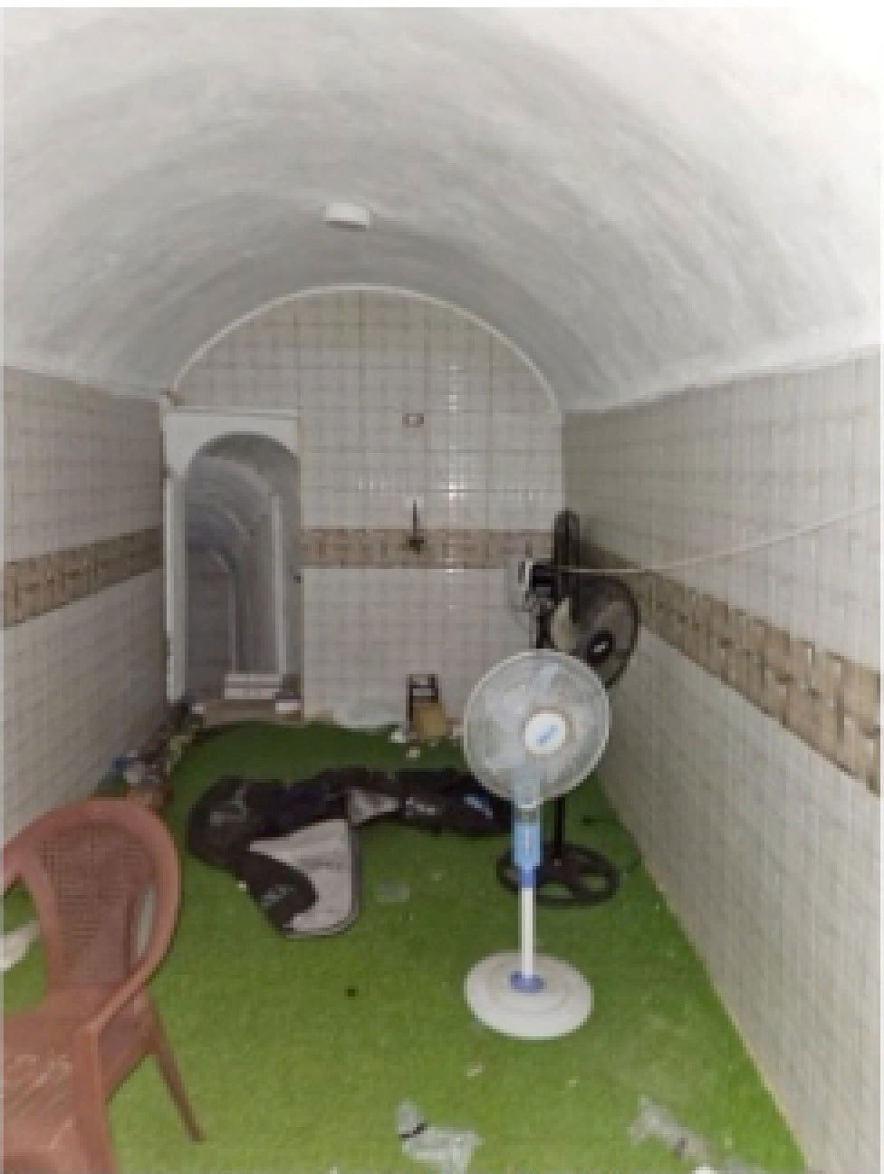 An underground cell which, according to Israel's military, was used by Palestinian Islamist group Hamas to hold hostages in the Gaza Strip, in this handout picture released on January 20, 2024. 