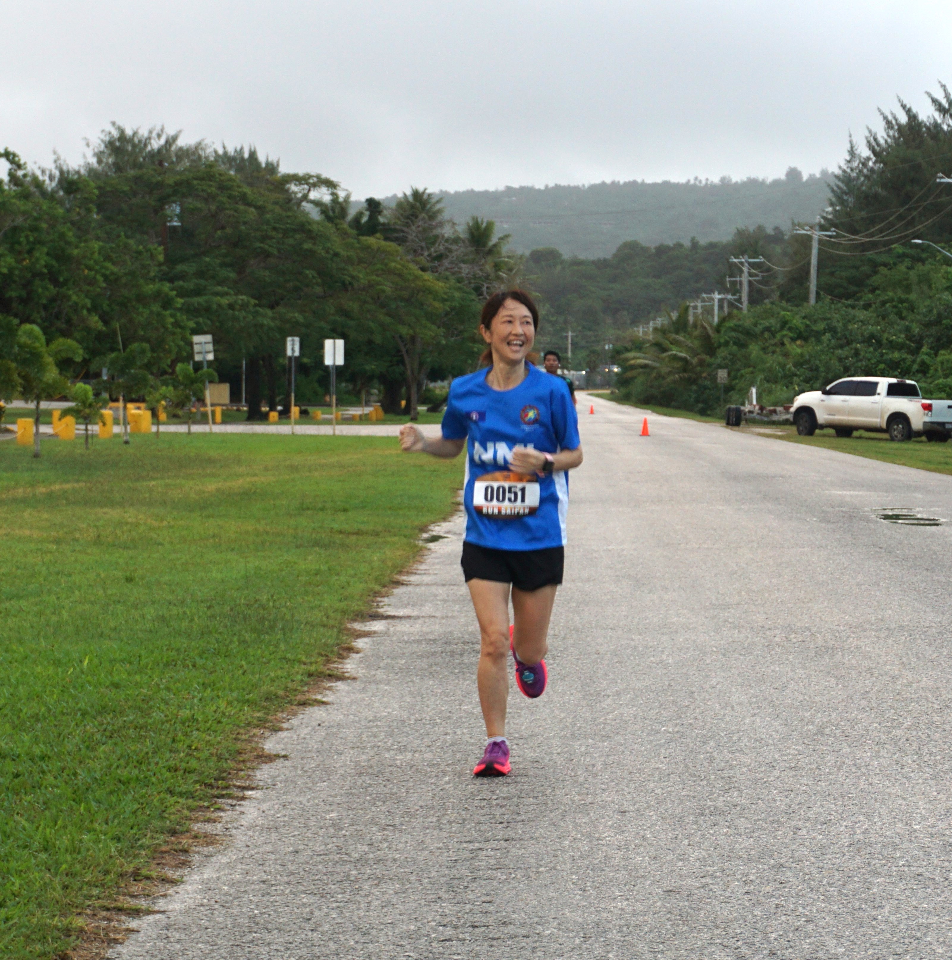 Chiharu Sato finishes first in the 50-54 age group of Run from 2023 at Smiling Cove Marina on Sunday.