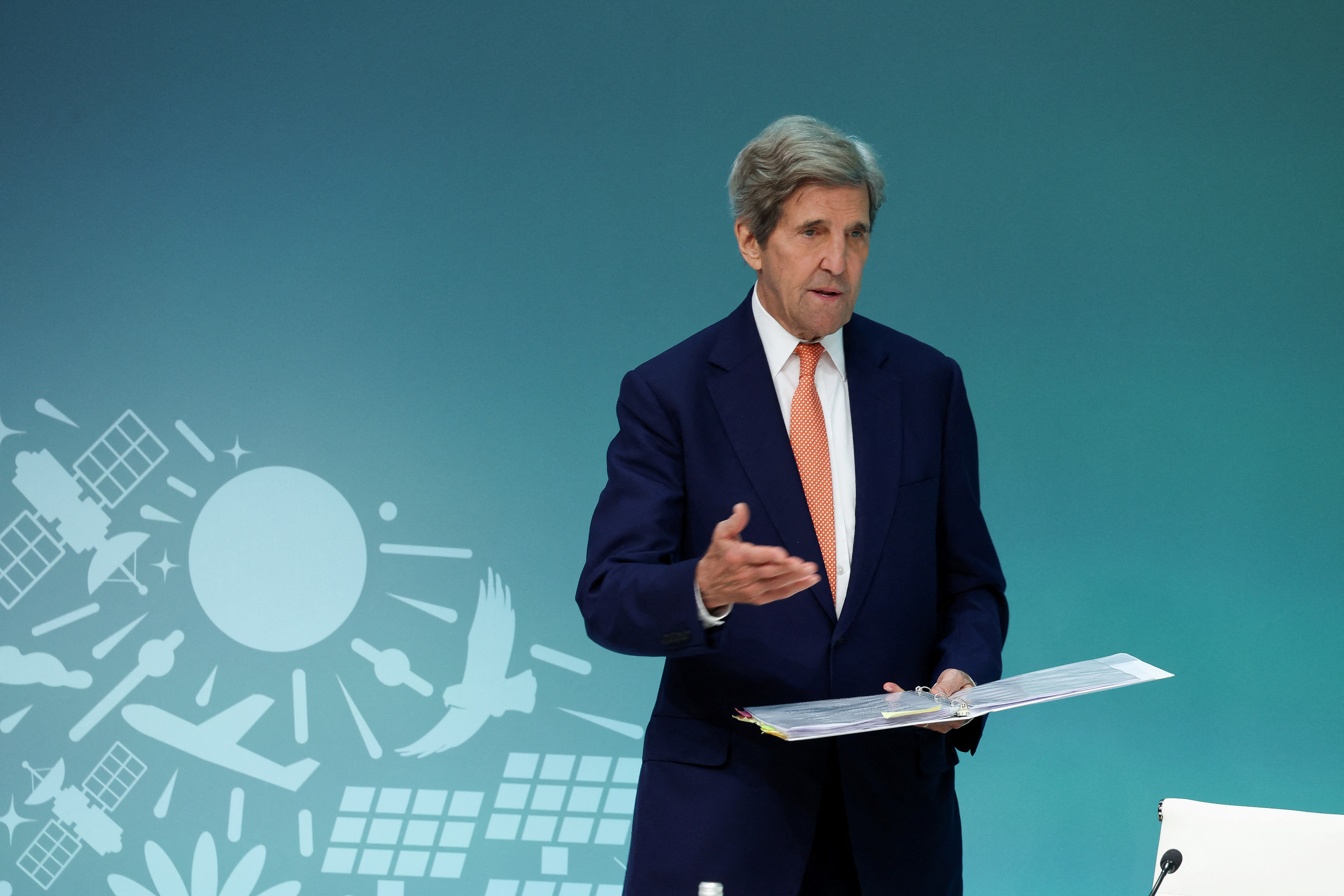 U.S. Climate Envoy John Kerry speaks during a press conference, after a draft of a negotiation deal was released, at the United Nations Climate Change Conference COP28 in Dubai, United Arab Emirates, December 13, 2023. 