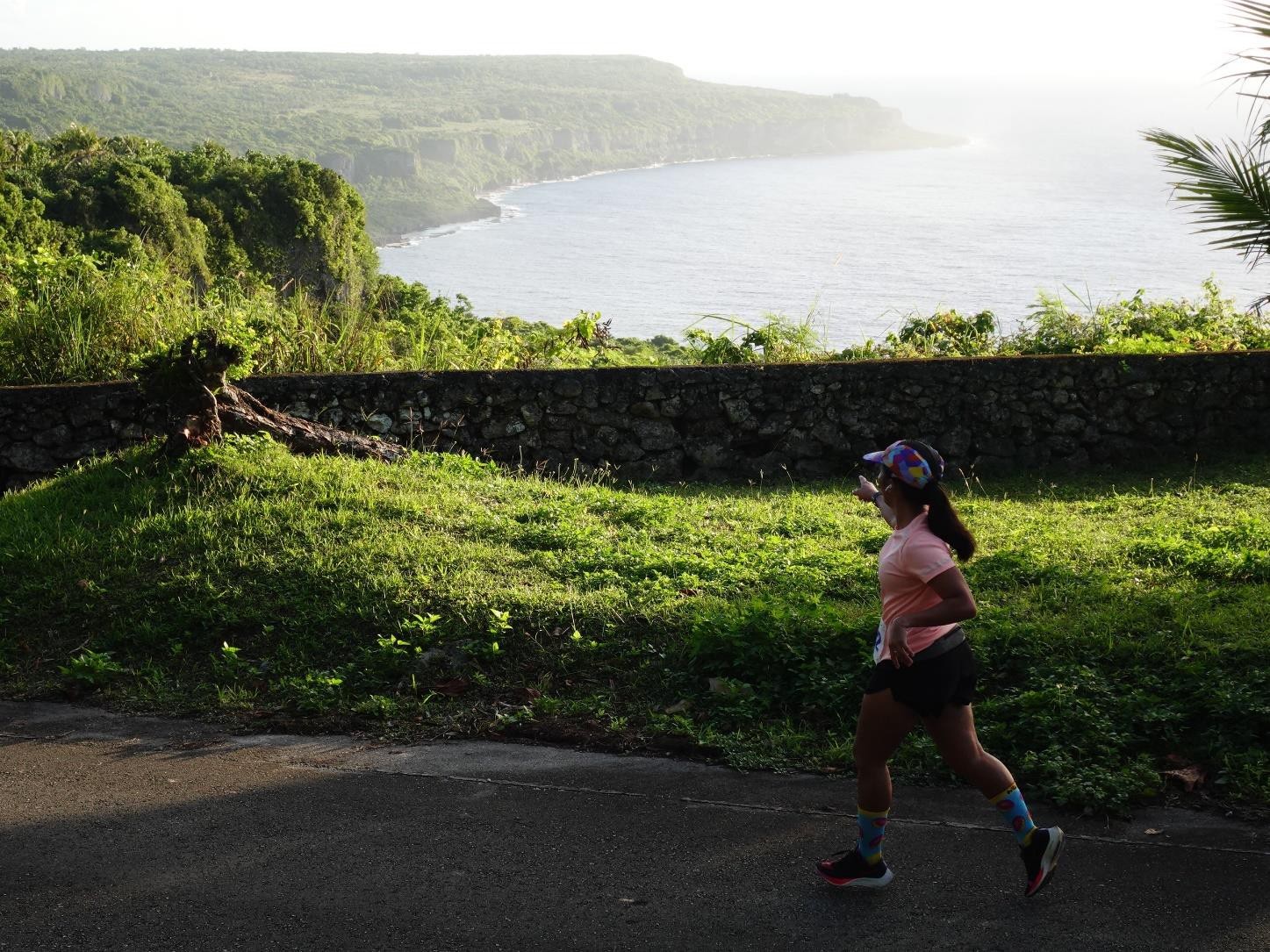 Roxanne Soriano of Saipan takes in the view of Alaguan Bay at Rota Marathon 2024 on Jan. 13, 2024.