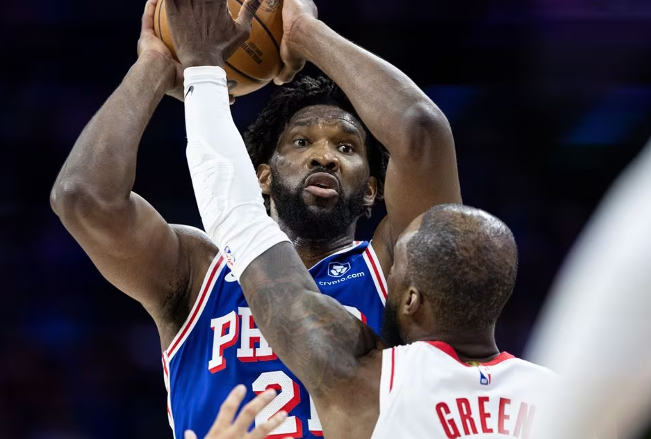 Philadelphia 76ers center Joel Embiid (21) controls the ball against Houston Rockets forward Jeff Green (32) during the second quarter at Wells Fargo Center in Philadelphia, Pennsylvania, Jan. 15, 2024.