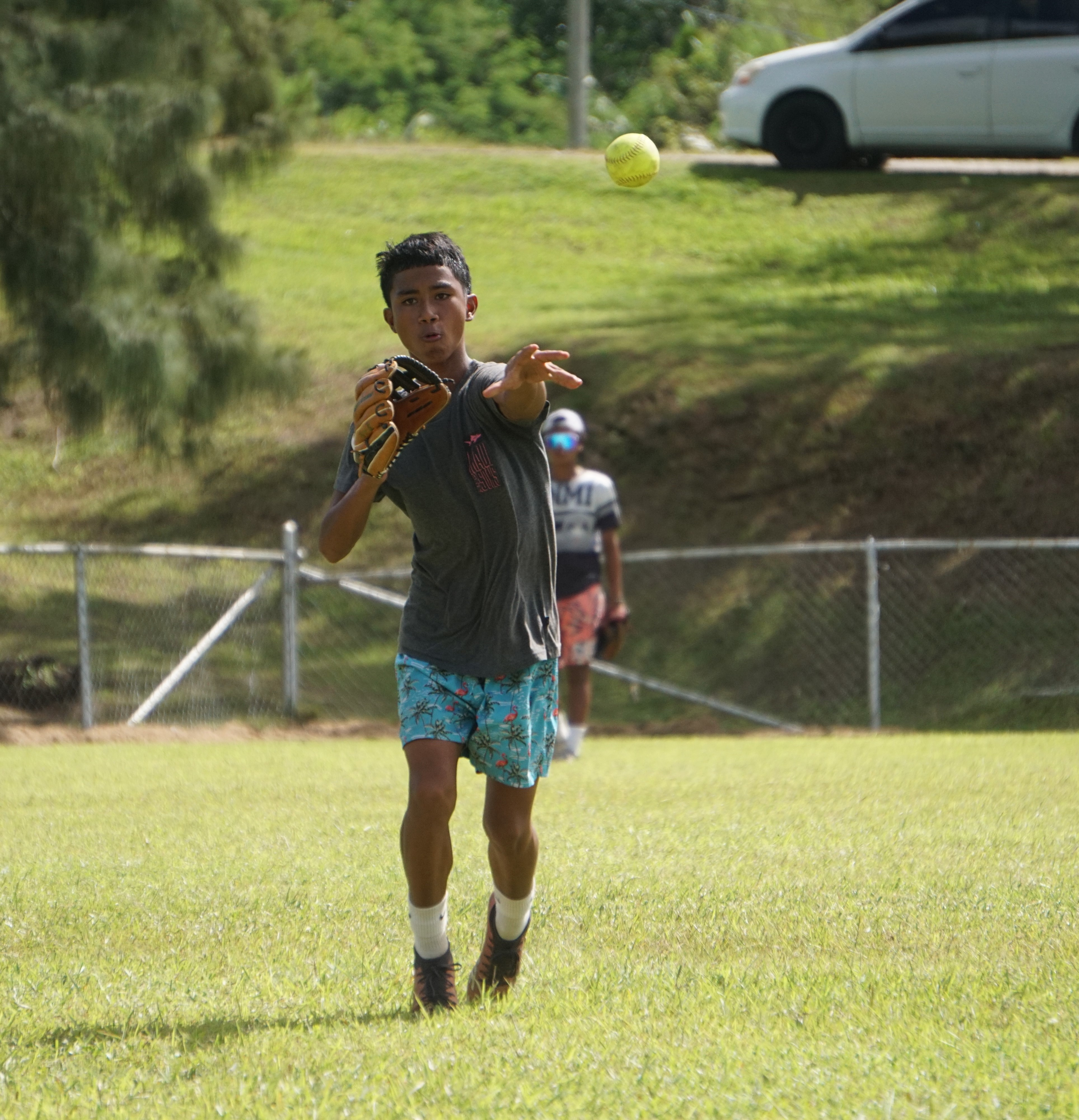 Tanapag Middle School shortstop Justin Garde throws the ball infield for the out during the boys middle school division championship game of the SBL-PSS Interscholastic Softball League SY23-24 at the Capital Hill baseball field on Saturday.